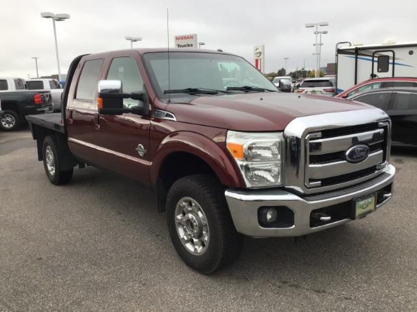 2012 MAROON /Black Leather Interior Ford F-350 SD Lariat Crew Cab 4WD (1FT8W3BTXCE) with an 6.7L V8 OHV 16V DIESEL engine, 6-Speed Automatic transmission, located at 1235 N Woodruff Ave., Idaho Falls, 83401, (208) 523-1053, 43.507172, -112.000488 - This 2012 F350 Lariat, has the 6.7L motor. Only has 103,372 miles. It is a flat bed. It comes with black leather seats, sunroof, navigation, heated and cooled seats,, and the exterior and interior are in great condition. At Timberline Auto it is always easy to find a great deal on your next vehicle - Photo#6