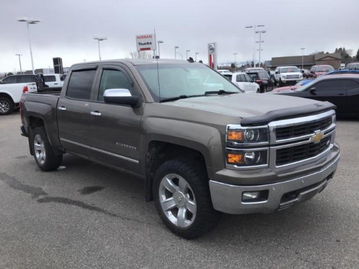 2014 Brownstone Metallic /Cocoa/Dune Chevrolet Silverado 1500 1LZ Crew Cab 4WD (3GCUKSEC1EG) with an 5.3L V8 OHV 16V engine, 6-Speed Automatic transmission, located at 1235 N Woodruff Ave., Idaho Falls, 83401, (208) 523-1053, 43.507172, -112.000488 - This 2014 GMC 1500 4x4, has the 5.3L V8 motor. It has 122,000 miles. It comes with leather seats, power seats, keyless remote, dual power seats, and cruise control. At Timberline Auto it is always easy to find a great deal on your next vehicle! Our experienced sales staff can help find the right veh - Photo#6