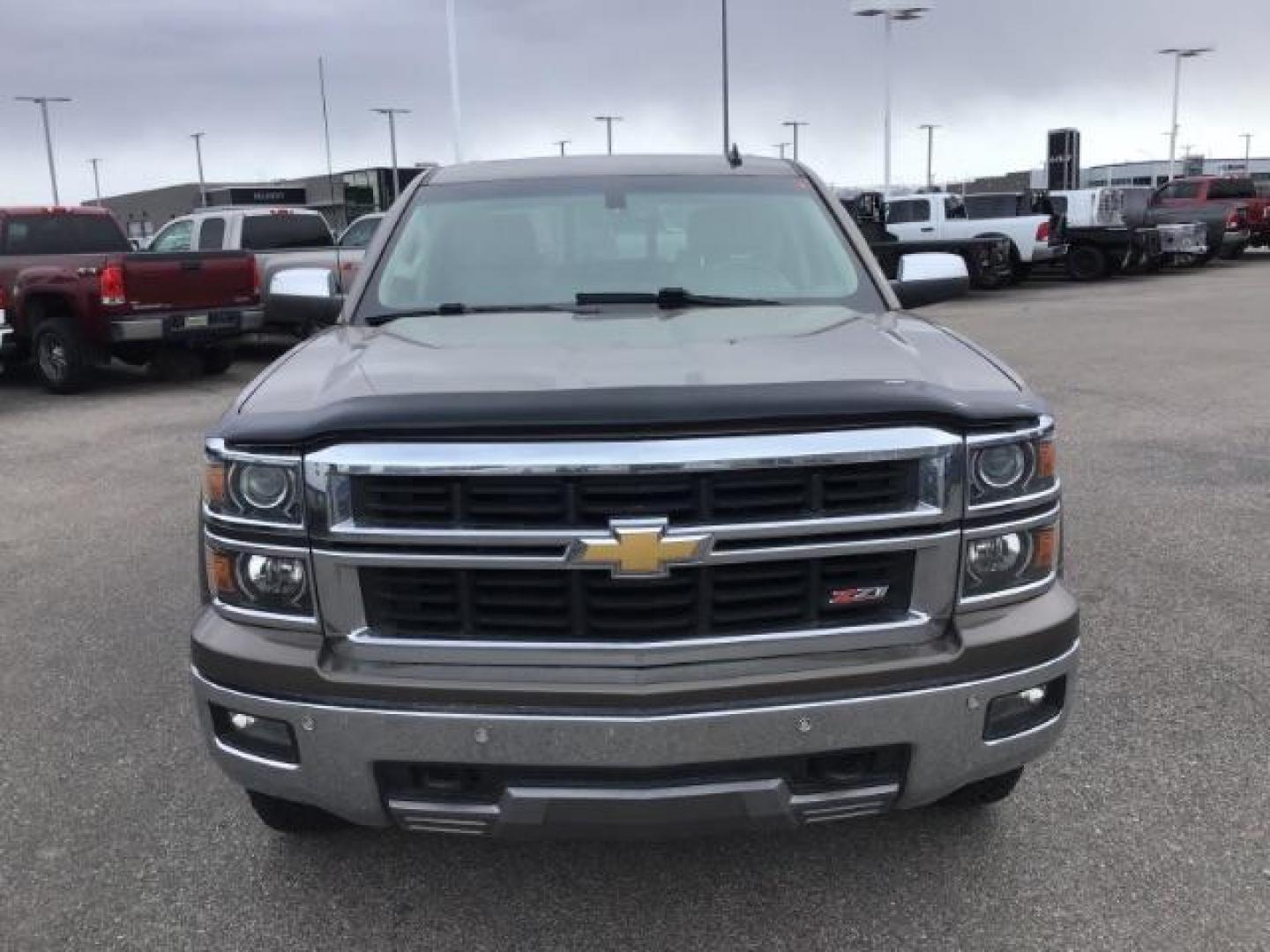 2014 Brownstone Metallic /Cocoa/Dune Chevrolet Silverado 1500 1LZ Crew Cab 4WD (3GCUKSEC1EG) with an 5.3L V8 OHV 16V engine, 6-Speed Automatic transmission, located at 1235 N Woodruff Ave., Idaho Falls, 83401, (208) 523-1053, 43.507172, -112.000488 - This 2014 GMC 1500 4x4, has the 5.3L V8 motor. It has 122,000 miles. It comes with leather seats, power seats, keyless remote, dual power seats, and cruise control. At Timberline Auto it is always easy to find a great deal on your next vehicle! Our experienced sales staff can help find the right veh - Photo#7