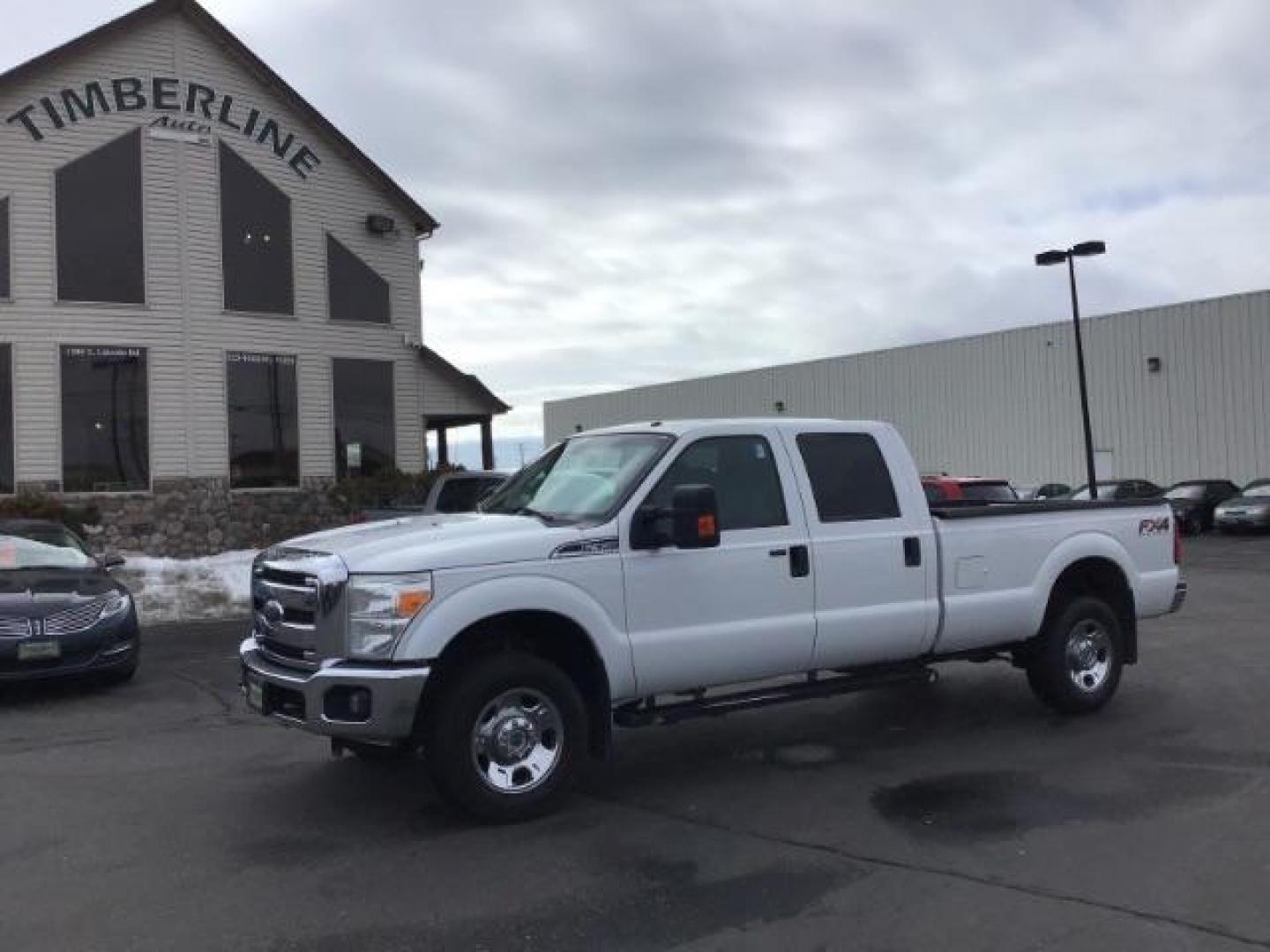 2014 Oxford White /Steel Ford F-350 SD XLT Crew Cab Long Bed 4WD (1FT8W3B60EE) with an 6.2L V8 OHV 16V engine, 6-Speed Automatic transmission, located at 1235 N Woodruff Ave., Idaho Falls, 83401, (208) 523-1053, 43.507172, -112.000488 - This 2014 Ford F350 XLT 4x4, has 235,000 miles. It has the 6.2L V8 motor. Comes with cloth interior, cruise control, power windows and locks. At Timberline Auto it is always easy to find a great deal on your next vehicle! Our experienced sales staff can help find the right vehicle will fit your ne - Photo#0