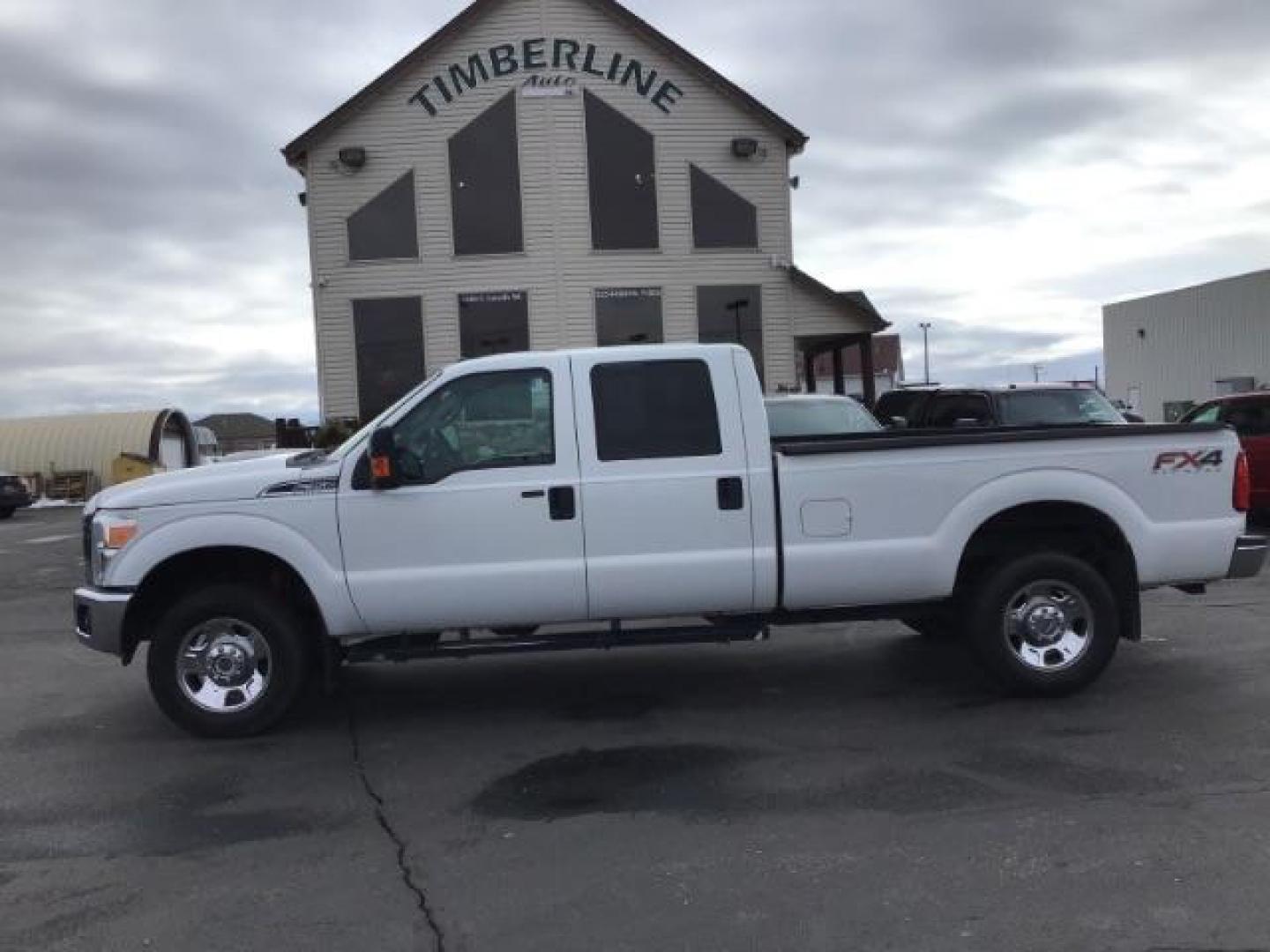 2014 Oxford White /Steel Ford F-350 SD XLT Crew Cab Long Bed 4WD (1FT8W3B60EE) with an 6.2L V8 OHV 16V engine, 6-Speed Automatic transmission, located at 1235 N Woodruff Ave., Idaho Falls, 83401, (208) 523-1053, 43.507172, -112.000488 - This 2014 Ford F350 XLT 4x4, has 235,000 miles. It has the 6.2L V8 motor. Comes with cloth interior, cruise control, power windows and locks. At Timberline Auto it is always easy to find a great deal on your next vehicle! Our experienced sales staff can help find the right vehicle will fit your ne - Photo#1