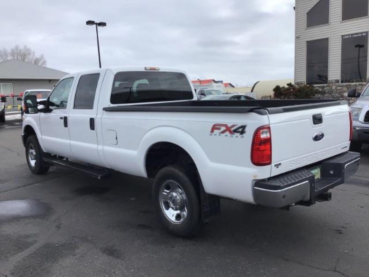 2014 Oxford White /Steel Ford F-350 SD XLT Crew Cab Long Bed 4WD (1FT8W3B60EE) with an 6.2L V8 OHV 16V engine, 6-Speed Automatic transmission, located at 1235 N Woodruff Ave., Idaho Falls, 83401, (208) 523-1053, 43.507172, -112.000488 - This 2014 Ford F350 XLT 4x4, has 235,000 miles. It has the 6.2L V8 motor. Comes with cloth interior, cruise control, power windows and locks. At Timberline Auto it is always easy to find a great deal on your next vehicle! Our experienced sales staff can help find the right vehicle will fit your ne - Photo#2