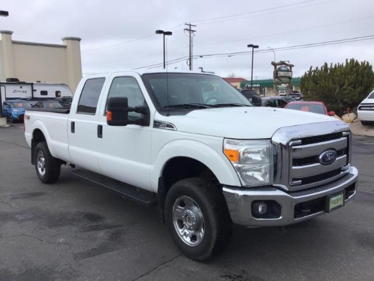 2014 Oxford White /Steel Ford F-350 SD XLT Crew Cab Long Bed 4WD (1FT8W3B60EE) with an 6.2L V8 OHV 16V engine, 6-Speed Automatic transmission, located at 1235 N Woodruff Ave., Idaho Falls, 83401, (208) 523-1053, 43.507172, -112.000488 - This 2014 Ford F350 XLT 4x4, has 235,000 miles. It has the 6.2L V8 motor. Comes with cloth interior, cruise control, power windows and locks. At Timberline Auto it is always easy to find a great deal on your next vehicle! Our experienced sales staff can help find the right vehicle will fit your ne - Photo#6