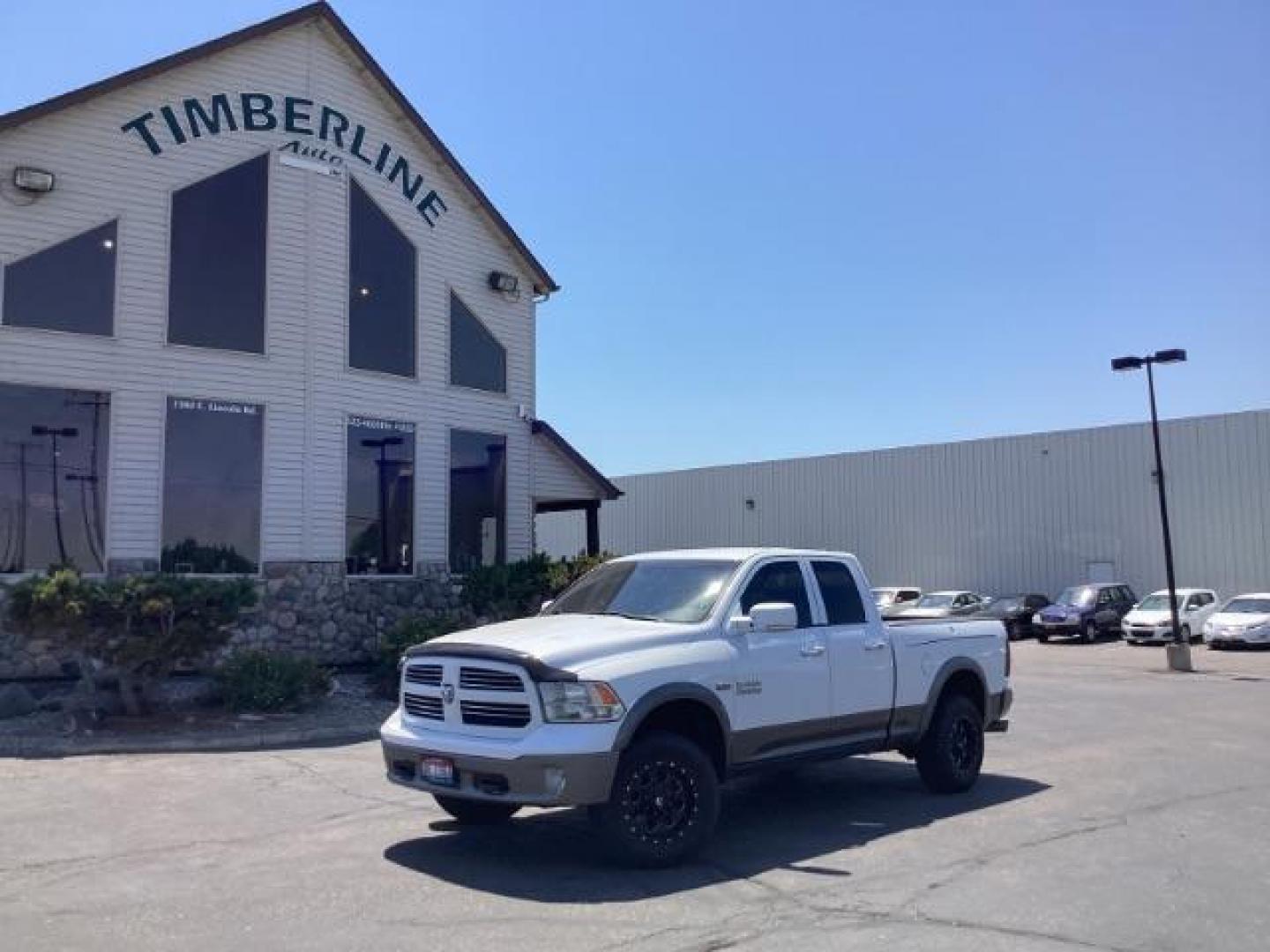 2013 WHITE RAM 1500 SLT Quad Cab 4WD (1C6RR7GTXDS) with an 5.7L V8 OHV 16V engine, 6-Speed Automatic transmission, located at 1235 N Woodruff Ave., Idaho Falls, 83401, (208) 523-1053, 43.507172, -112.000488 - Photo#0