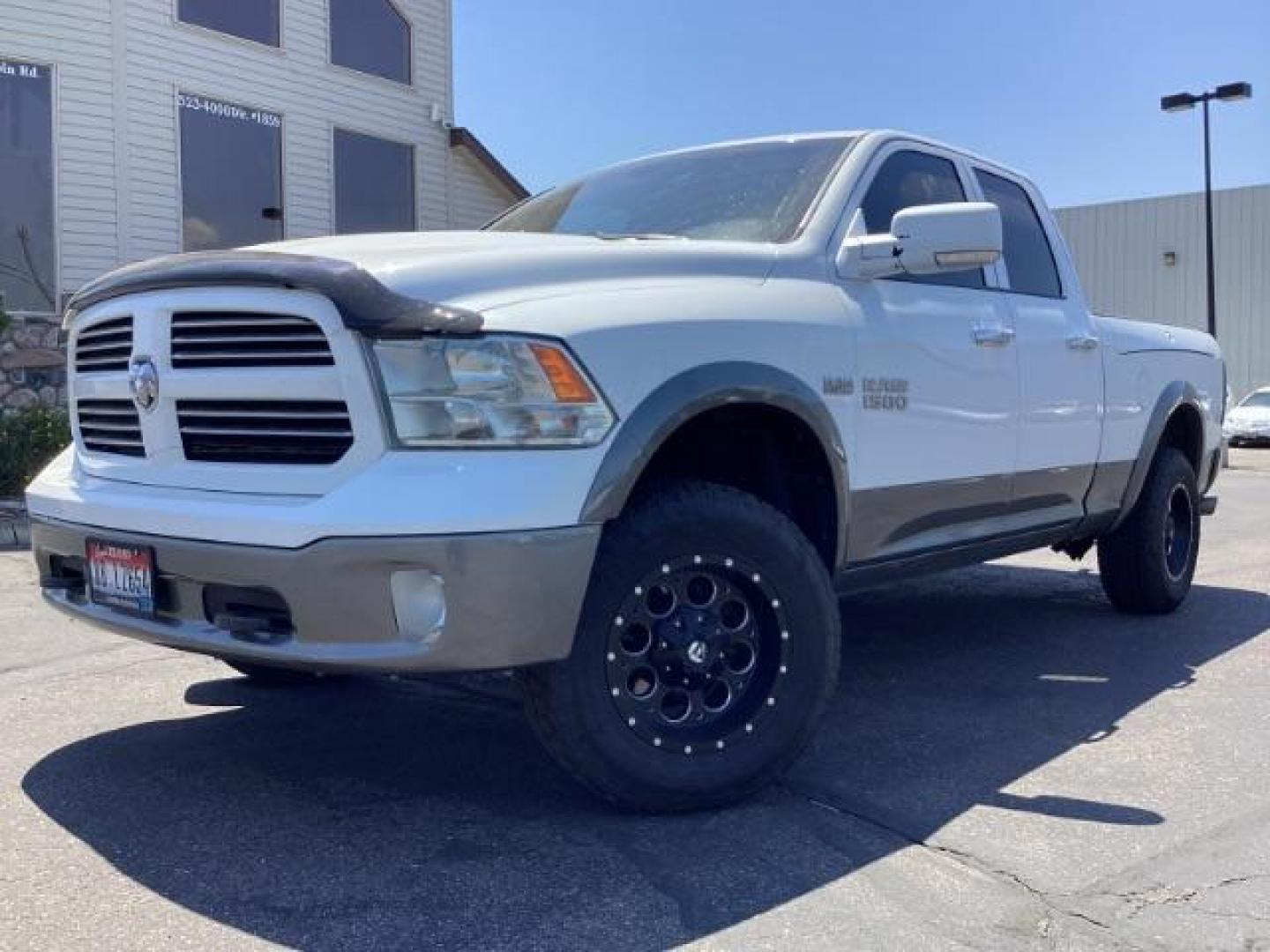 2013 WHITE RAM 1500 SLT Quad Cab 4WD (1C6RR7GTXDS) with an 5.7L V8 OHV 16V engine, 6-Speed Automatic transmission, located at 1235 N Woodruff Ave., Idaho Falls, 83401, (208) 523-1053, 43.507172, -112.000488 - Photo#1