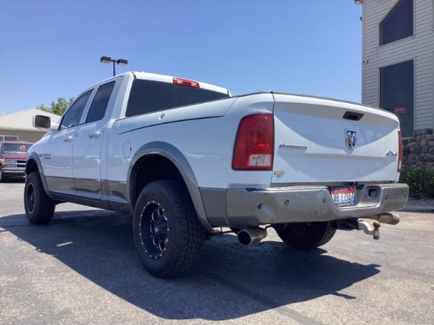 2013 WHITE RAM 1500 SLT Quad Cab 4WD (1C6RR7GTXDS) with an 5.7L V8 OHV 16V engine, 6-Speed Automatic transmission, located at 1235 N Woodruff Ave., Idaho Falls, 83401, (208) 523-1053, 43.507172, -112.000488 - Photo#2