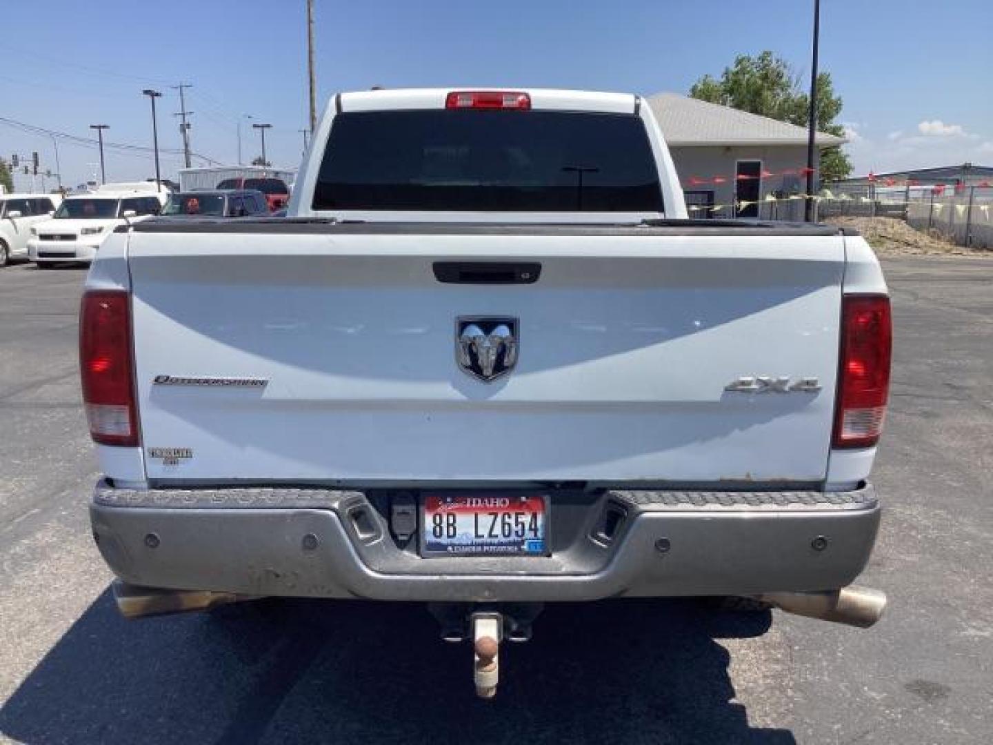 2013 WHITE RAM 1500 SLT Quad Cab 4WD (1C6RR7GTXDS) with an 5.7L V8 OHV 16V engine, 6-Speed Automatic transmission, located at 1235 N Woodruff Ave., Idaho Falls, 83401, (208) 523-1053, 43.507172, -112.000488 - Photo#4