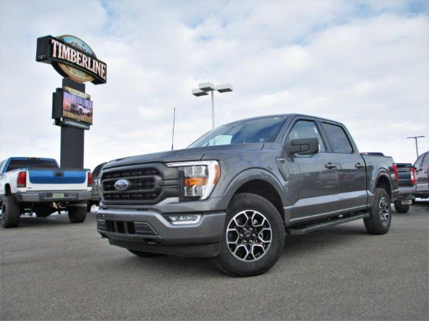 2022 Carbonized Gray Metallic /Black/Medium Dark Slate Ford F-150 Sport SuperCrew 5.5-ft. Bed 4WD (1FTFW1E86NK) with an 3.5L V6 DOHC 24V engine, 10-Speed Automatic transmission, located at 1235 N Woodruff Ave., Idaho Falls, 83401, (208) 523-1053, 43.507172, -112.000488 - Outside you see the factory sport wheels, wide running boards, and color matched bumpers, cloth grey interior with dual power heated seats, large 12 inch touchscreen display offering a high definition back up camera, blind spot monitors, lane assist, remote start, remote tailgate, trailer towing te - Photo#0