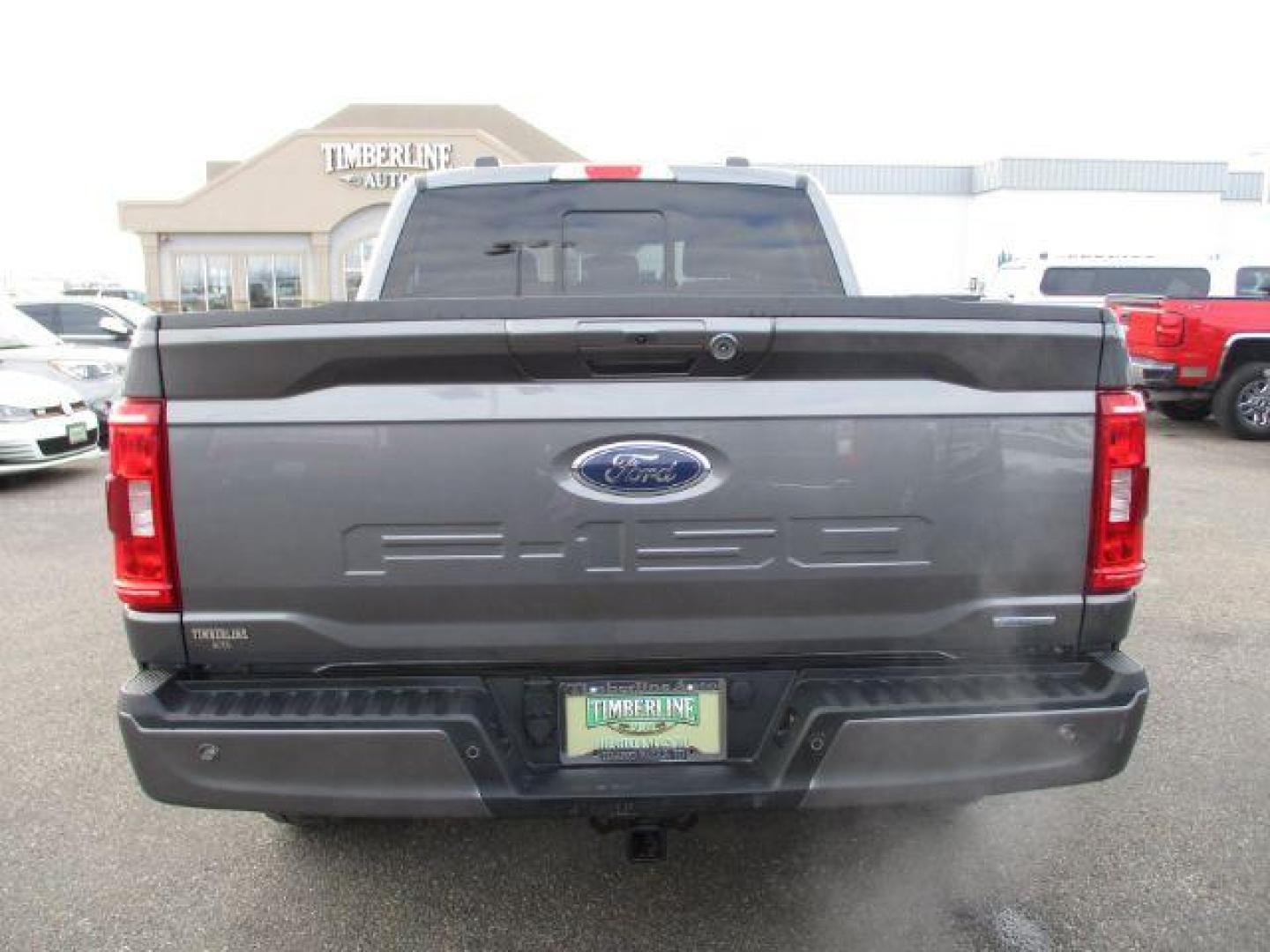 2022 Carbonized Gray Metallic /Black/Medium Dark Slate Ford F-150 Sport SuperCrew 5.5-ft. Bed 4WD (1FTFW1E86NK) with an 3.5L V6 DOHC 24V engine, 10-Speed Automatic transmission, located at 1235 N Woodruff Ave., Idaho Falls, 83401, (208) 523-1053, 43.507172, -112.000488 - Outside you see the factory sport wheels, wide running boards, and color matched bumpers, cloth grey interior with dual power heated seats, large 12 inch touchscreen display offering a high definition back up camera, blind spot monitors, lane assist, remote start, remote tailgate, trailer towing te - Photo#4