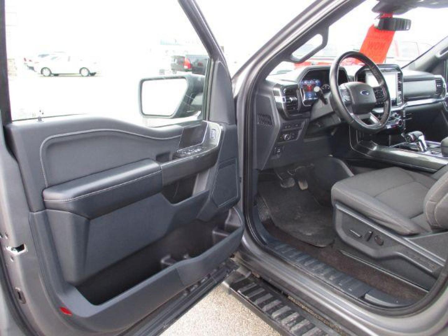 2022 Carbonized Gray Metallic /Black/Medium Dark Slate Ford F-150 Sport SuperCrew 5.5-ft. Bed 4WD (1FTFW1E86NK) with an 3.5L V6 DOHC 24V engine, 10-Speed Automatic transmission, located at 1235 N Woodruff Ave., Idaho Falls, 83401, (208) 523-1053, 43.507172, -112.000488 - Outside you see the factory sport wheels, wide running boards, and color matched bumpers, cloth grey interior with dual power heated seats, large 12 inch touchscreen display offering a high definition back up camera, blind spot monitors, lane assist, remote start, remote tailgate, trailer towing te - Photo#9