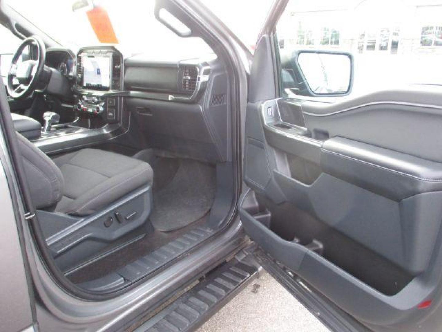 2022 Carbonized Gray Metallic /Black/Medium Dark Slate Ford F-150 Sport SuperCrew 5.5-ft. Bed 4WD (1FTFW1E86NK) with an 3.5L V6 DOHC 24V engine, 10-Speed Automatic transmission, located at 1235 N Woodruff Ave., Idaho Falls, 83401, (208) 523-1053, 43.507172, -112.000488 - Outside you see the factory sport wheels, wide running boards, and color matched bumpers, cloth grey interior with dual power heated seats, large 12 inch touchscreen display offering a high definition back up camera, blind spot monitors, lane assist, remote start, remote tailgate, trailer towing te - Photo#20