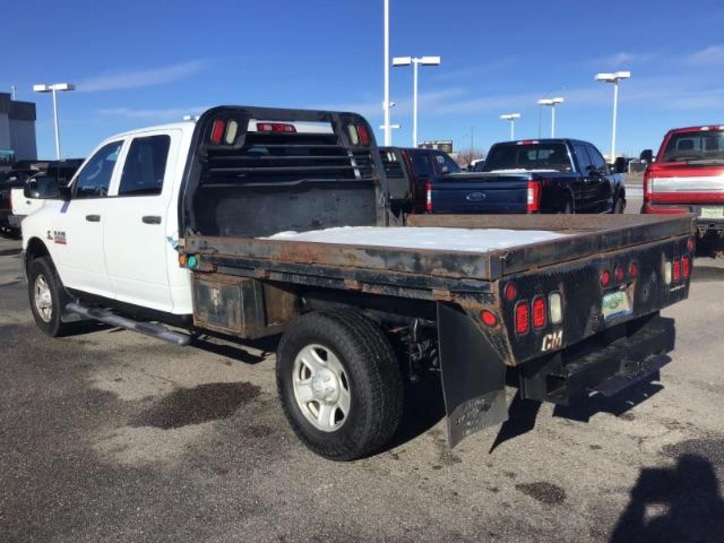 2014 WHITE /WHITE RAM 2500 ST Crew Cab LWB 4WD (3C6UR5HL1EG) with an 6.7L L6 OHV 24V TURBO DIESEL engine, 6-Speed Automatic transmission, located at 1235 N Woodruff Ave., Idaho Falls, 83401, (208) 523-1053, 43.507172, -112.000488 - This 2014 Ram 2500 SLT, has the 6.7L diesel motor. It has 189,551 miles. it has a flat bed. It is a mega cab. It has AM/FM CD stereo, power door looks, power windows, and 4x4. At Timberline Auto it is always easy to find a great deal on your next vehicle! Our experienced sales staff can help find t - Photo#2