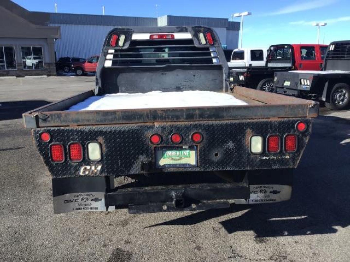 2014 WHITE /WHITE RAM 2500 ST Crew Cab LWB 4WD (3C6UR5HL1EG) with an 6.7L L6 OHV 24V TURBO DIESEL engine, 6-Speed Automatic transmission, located at 1235 N Woodruff Ave., Idaho Falls, 83401, (208) 523-1053, 43.507172, -112.000488 - This 2014 Ram 2500 SLT, has the 6.7L diesel motor. It has 189,551 miles. it has a flat bed. It is a mega cab. It has AM/FM CD stereo, power door looks, power windows, and 4x4. At Timberline Auto it is always easy to find a great deal on your next vehicle! Our experienced sales staff can help find t - Photo#3