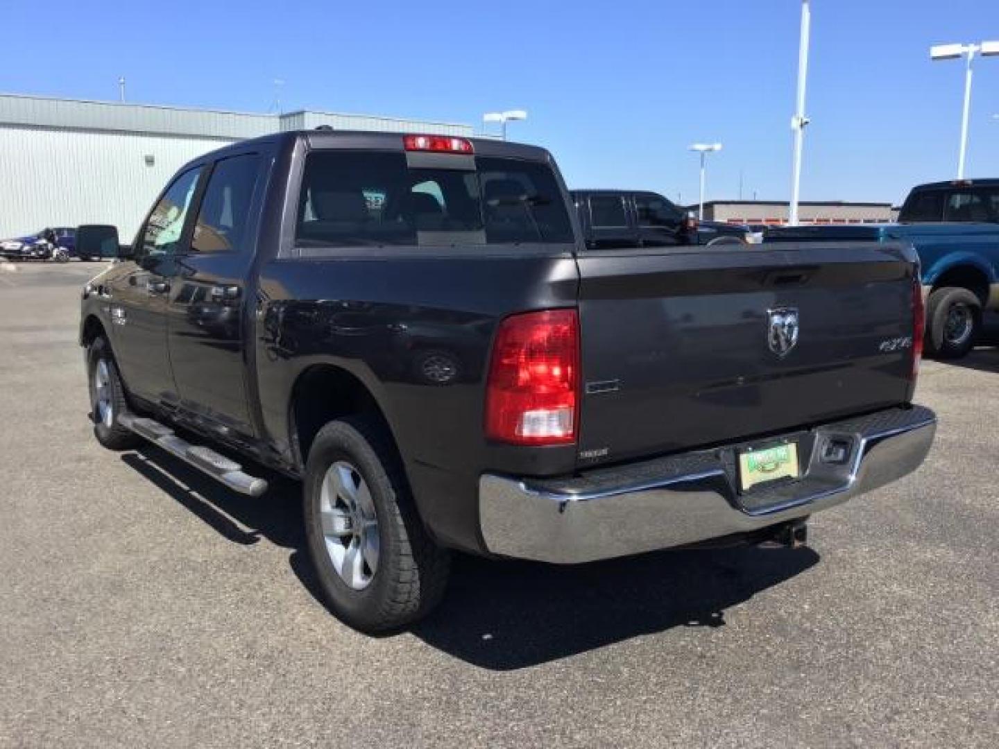 2016 GRAY /GRAY RAM 1500 SLT Crew Cab SWB 4WD (1C6RR7LT5GS) with an 5.7L V8 OHV 16V engine, 8-Speed Automatic transmission, located at 1235 N Woodruff Ave., Idaho Falls, 83401, (208) 523-1053, 43.507172, -112.000488 - If you're in the market for a pick up truck that is not loaded to the gills with computer chips and fancy new features, here's your truck! This 2016 RAM 1500 is your basic up and down 4WD crew cab short bed vehicle. Although it may be basic, it is still very efficient and you'll be able to take adva - Photo#3