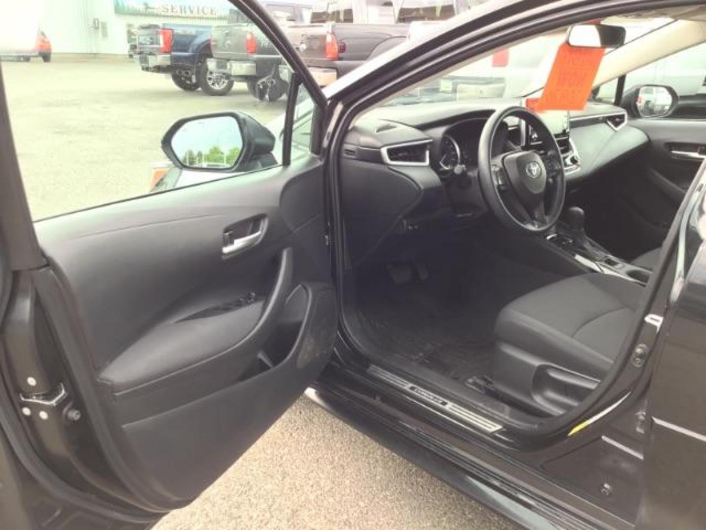 2021 BLACK /Black, cloth Toyota Corolla LE (5YFEPMAE1MP) with an 1.8L L4 DOHC 16V engine, Automatic transmission, located at 1235 N Woodruff Ave., Idaho Falls, 83401, (208) 523-1053, 43.507172, -112.000488 - This 2021 Toyota Corolla LE is in as good of shape as the day it rolled off the lot! Inside, outside, and mechanically it is in amazing condition! This one comes with a large touch screen display, rubber floor mats in the front, near new tires with 95% tread left, steering wheel mounted controls, la - Photo#9