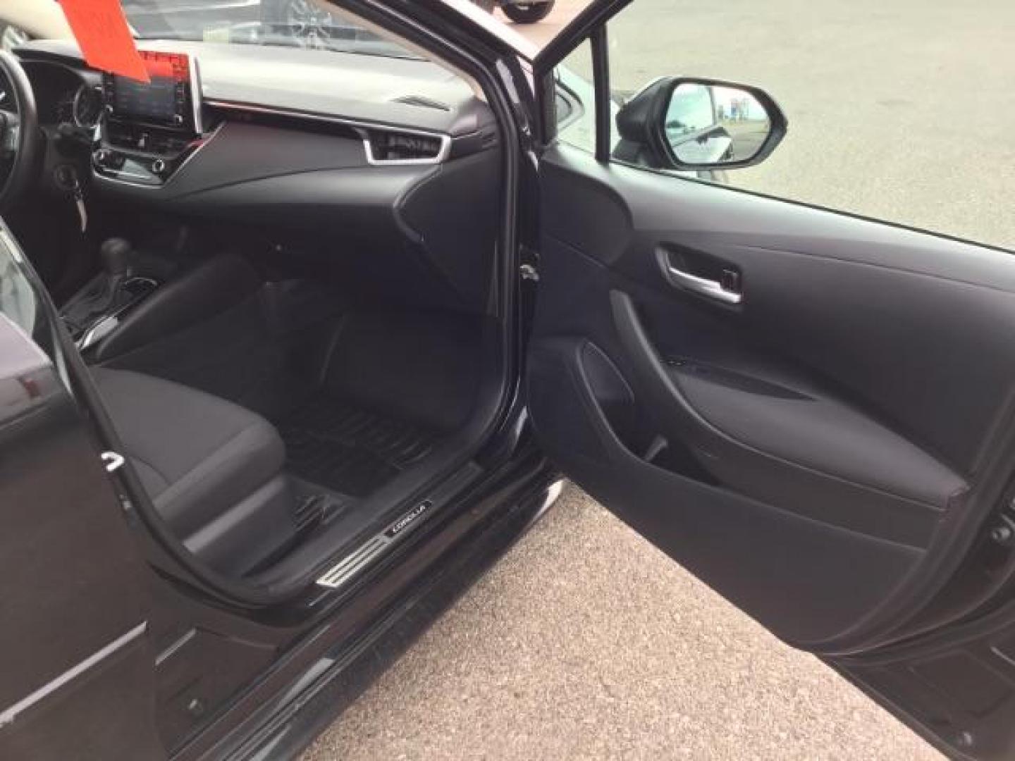 2021 BLACK /Black, cloth Toyota Corolla LE (5YFEPMAE1MP) with an 1.8L L4 DOHC 16V engine, Automatic transmission, located at 1235 N Woodruff Ave., Idaho Falls, 83401, (208) 523-1053, 43.507172, -112.000488 - This 2021 Toyota Corolla LE is in as good of shape as the day it rolled off the lot! Inside, outside, and mechanically it is in amazing condition! This one comes with a large touch screen display, rubber floor mats in the front, near new tires with 95% tread left, steering wheel mounted controls, la - Photo#19