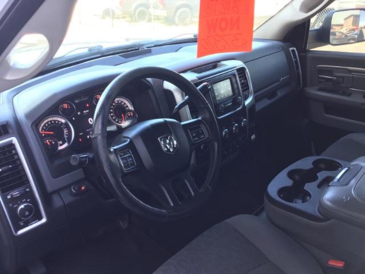 2017 Bright White Clear Coat /Black/Diesel Gray, premium cloth RAM 2500 SLT Crew Cab LWB 4WD (3C6UR5JJ7HG) with an 6.4L V8 engine, 6-Speed Automatic transmission, located at 1235 N Woodruff Ave., Idaho Falls, 83401, (208) 523-1053, 43.507172, -112.000488 - Here's your new pre-owned three-quarter ton, gas powered, crew cab, long bed pick up! With the 6.4L HEMI this truck has a max towing capacity of 19,580 lbs! Inside you will see a premium cloth interior capable of seating six people with plenty of comfort features. At Timberline Auto it is always eas - Photo#11