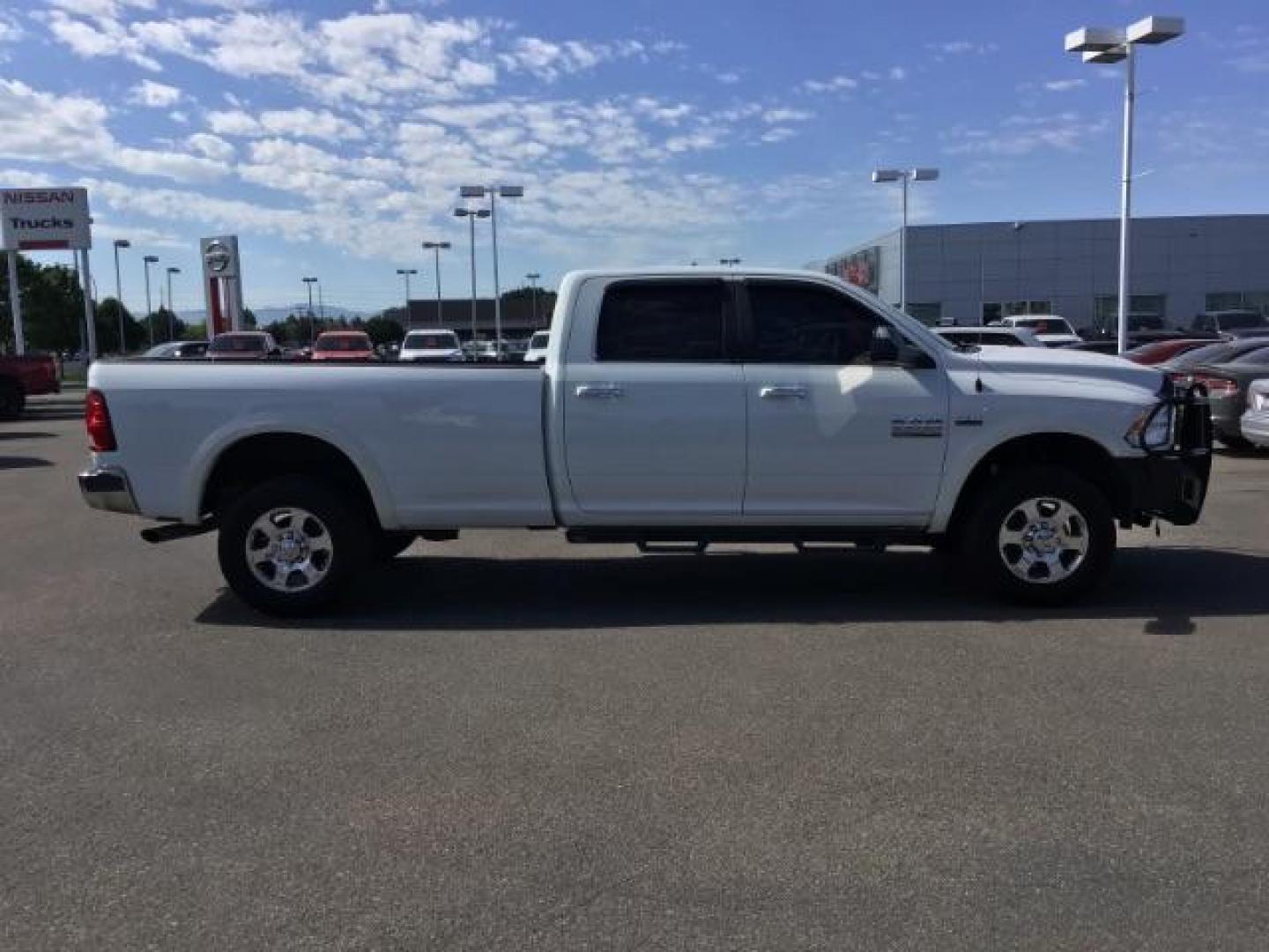 2017 Bright White Clear Coat /Black/Diesel Gray, premium cloth RAM 2500 SLT Crew Cab LWB 4WD (3C6UR5JJ7HG) with an 6.4L V8 engine, 6-Speed Automatic transmission, located at 1235 N Woodruff Ave., Idaho Falls, 83401, (208) 523-1053, 43.507172, -112.000488 - Here's your new pre-owned three-quarter ton, gas powered, crew cab, long bed pick up! With the 6.4L HEMI this truck has a max towing capacity of 19,580 lbs! Inside you will see a premium cloth interior capable of seating six people with plenty of comfort features. At Timberline Auto it is always eas - Photo#6