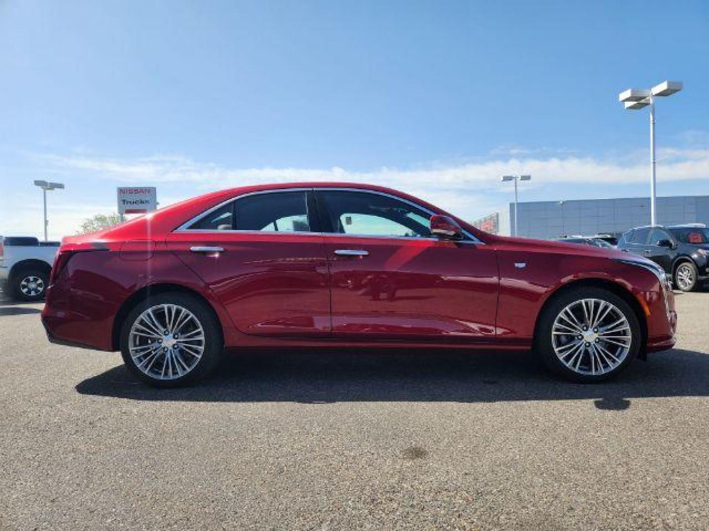 2022 Infrared Tintcoat /Cinnamon w/Jet Black Accents Cadillac CT4 Premium Luxury (1G6DF5RL7N0) with an 2.7L L4 DOHC 16V TURBO engine, 8-Speed Automatic transmission, located at 1235 N Woodruff Ave., Idaho Falls, 83401, (208) 523-1053, 43.507172, -112.000488 - Photo#6