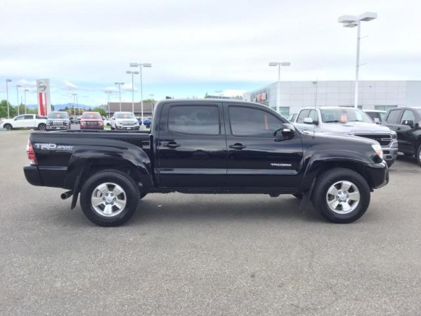 2015 Black /Gray, cloth Toyota Tacoma TRD SPORT Double Cab (3TMLU4EN8FM) with an 4.0L V6 DOHC 24V engine, Automatic transmission, located at 1235 N Woodruff Ave., Idaho Falls, 83401, (208) 523-1053, 43.507172, -112.000488 - Here's your chance at one of the most popular vehicles on the market! This Tacoma is in great shape inside and out! The TRD-SPORT gives you the color matched bumpers, the bigger display, and a few other goodies! The bed has a factory liner and the interior has rubber floor mats in the front with clo - Photo#6