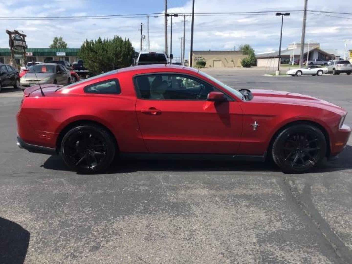 2012 RED /RED Ford Mustang V6 Coupe (1ZVBP8AM7C5) with an 3.7L V6 DOHC 24V engine, 6-Speed Automatic | 6-Speed Manual transmission, located at 1235 N Woodruff Ave., Idaho Falls, 83401, (208) 523-1053, 43.507172, -112.000488 - This 2012 Ford Mustang has 100,502 miles, V6 motor., leather interior, heated seats, Bluetooth, steering wheel audio controls. At Timberline Auto it is always easy to find a great deal on your next vehicle! Our experienced sales staff can help find the right vehicle will fit your needs. Our knowle - Photo#4