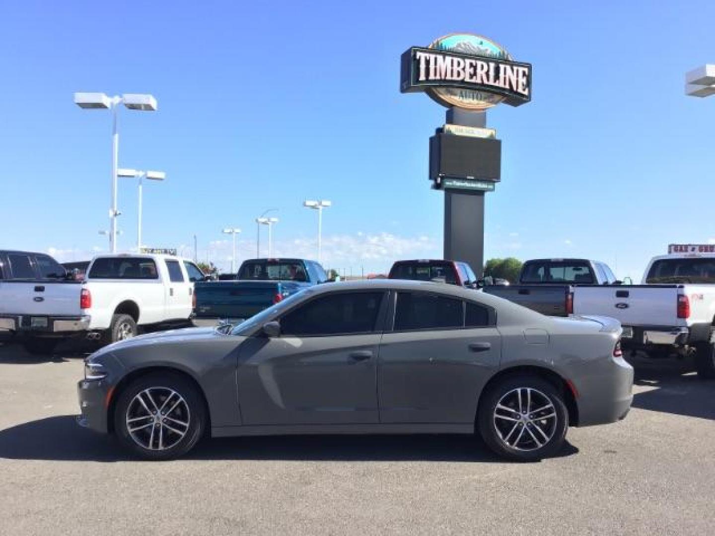 2019 Destroyer Grey Clear Coat /Black, cloth Dodge Charger SXT AWD (2C3CDXJG5KH) with an 3.6L V6 DOHC 24V engine, 8-Speed Automatic transmission, located at 1235 N Woodruff Ave., Idaho Falls, 83401, (208) 523-1053, 43.507172, -112.000488 - Here's your chance at a very clean and quality pre-owned AWD V6 Charger! If you've been looking for something fun to drive but don't want to spend V8 fuel costs, then here is your answer! This Charger has been very well maintained and is in great shape inside and out! This vehicle comes with near ne - Photo#2