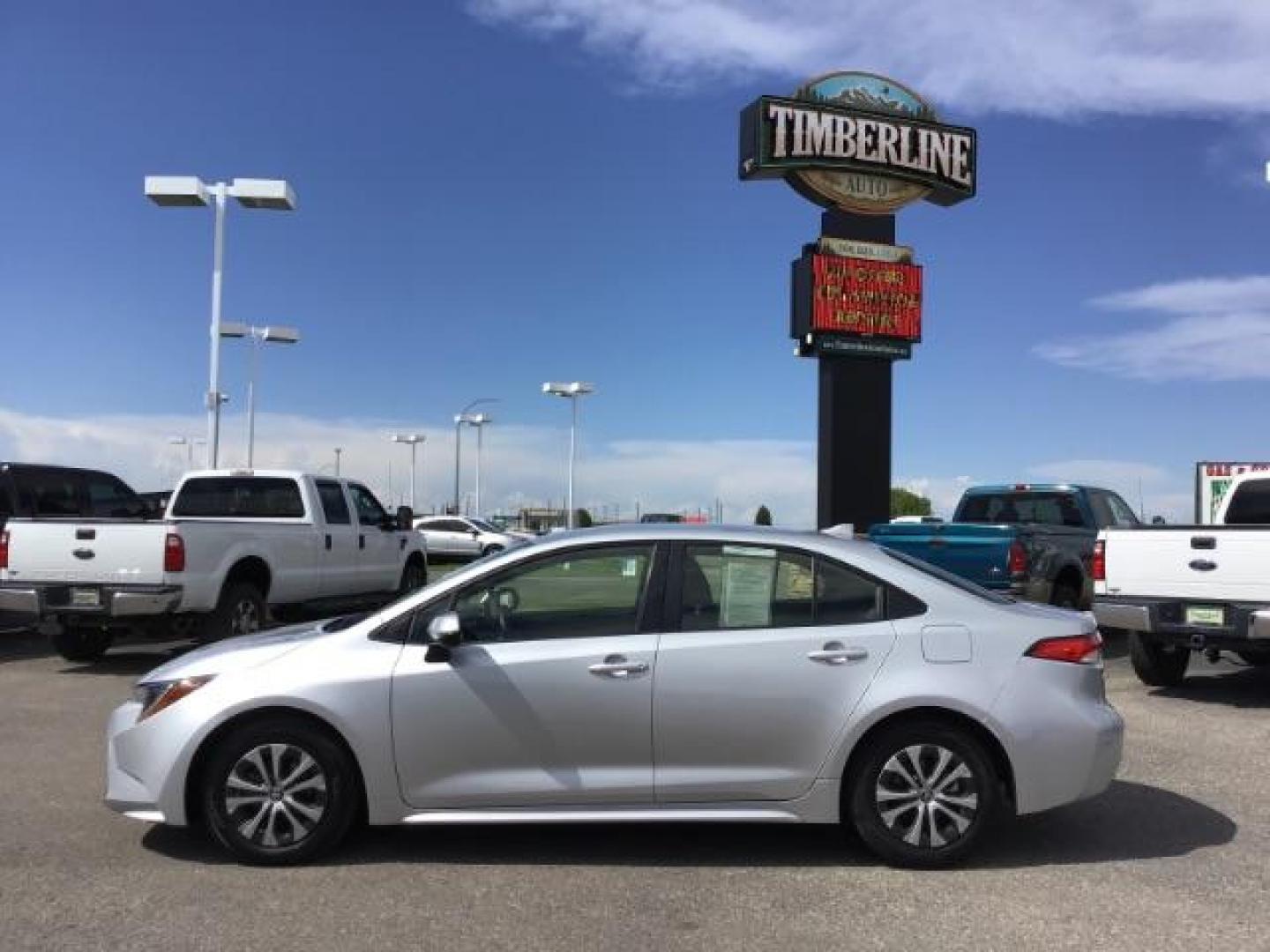 2022 SILVER /Gray, cloth Toyota Corolla LE Hybrid (JTDEAMDE3N3) with an 1.8L L4 DOHC 16V HYBRID engine, Automatic transmission, located at 1235 N Woodruff Ave., Idaho Falls, 83401, (208) 523-1053, 43.507172, -112.000488 - It is the HYBRID model with over 60 MPG!! The car comes with full sized rubber floor mats, a large touch screen display, blind spot monitor, newer tires with 90% tread, steering wheel mounted controls, push to start, back up camera, lane departure, collision avoidance, and so much more! At timberli - Photo#2