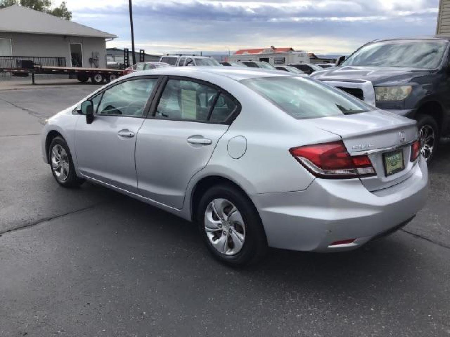 2013 Urban Titanium Metallic /Stone Cloth Interior Honda Civic LX Sedan 5-Speed AT (19XFB2F52DE) with an 1.8L L4 SOHC 16V engine, 5-Speed Automatic transmission, located at 1235 N Woodruff Ave., Idaho Falls, 83401, (208) 523-1053, 43.507172, -112.000488 - At Timberline Auto it is always easy to find a great deal on your next vehicle! Our experienced sales staff can help find the right vehicle will fit your needs. Our knowledgeable finance department has options for almost any credit score. We offer many warranty contract options to protect you new pr - Photo#2