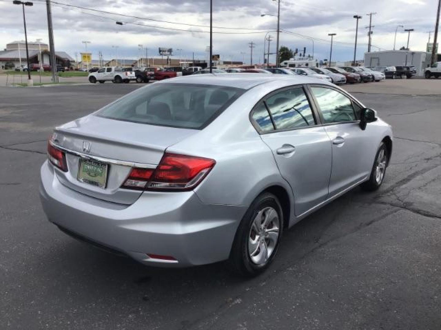 2013 Urban Titanium Metallic /Stone Cloth Interior Honda Civic LX Sedan 5-Speed AT (19XFB2F52DE) with an 1.8L L4 SOHC 16V engine, 5-Speed Automatic transmission, located at 1235 N Woodruff Ave., Idaho Falls, 83401, (208) 523-1053, 43.507172, -112.000488 - At Timberline Auto it is always easy to find a great deal on your next vehicle! Our experienced sales staff can help find the right vehicle will fit your needs. Our knowledgeable finance department has options for almost any credit score. We offer many warranty contract options to protect you new pr - Photo#4