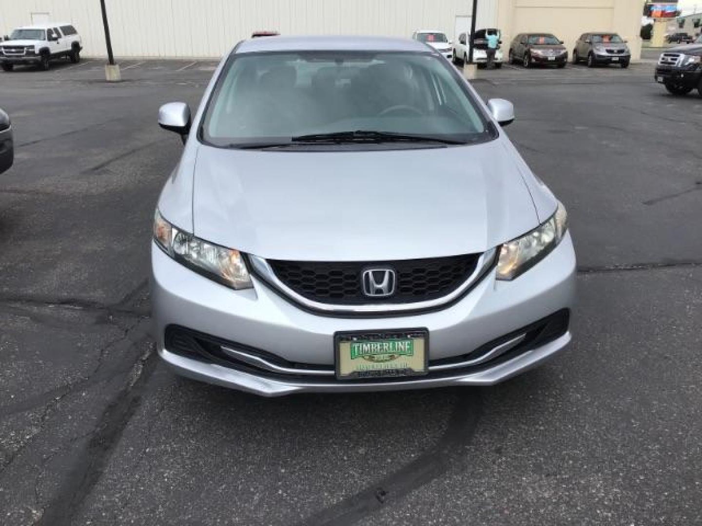 2013 Urban Titanium Metallic /Stone Cloth Interior Honda Civic LX Sedan 5-Speed AT (19XFB2F52DE) with an 1.8L L4 SOHC 16V engine, 5-Speed Automatic transmission, located at 1235 N Woodruff Ave., Idaho Falls, 83401, (208) 523-1053, 43.507172, -112.000488 - At Timberline Auto it is always easy to find a great deal on your next vehicle! Our experienced sales staff can help find the right vehicle will fit your needs. Our knowledgeable finance department has options for almost any credit score. We offer many warranty contract options to protect you new pr - Photo#7