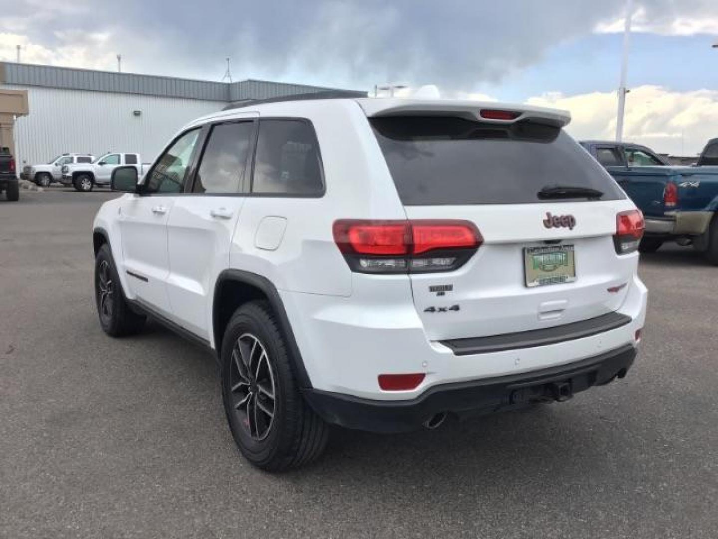 2020 Bright White Clear Coat /Black/Ruby Red, leather Jeep Grand Cherokee Trailhawk 4WD (1C4RJFLG5LC) with an 3.6L V6 DOHC 24V engine, 8-Speed Automatic transmission, located at 1235 N Woodruff Ave., Idaho Falls, 83401, (208) 523-1053, 43.507172, -112.000488 - Leather and loaded, heated and cooled seats, blind spot monitors, AWD, low miles. At Timberline Auto it is always easy to find a great deal on your next vehicle! Our experienced sales staff can help find the right vehicle that will fit your needs. Our knowledgeable finance department has options for - Photo#2