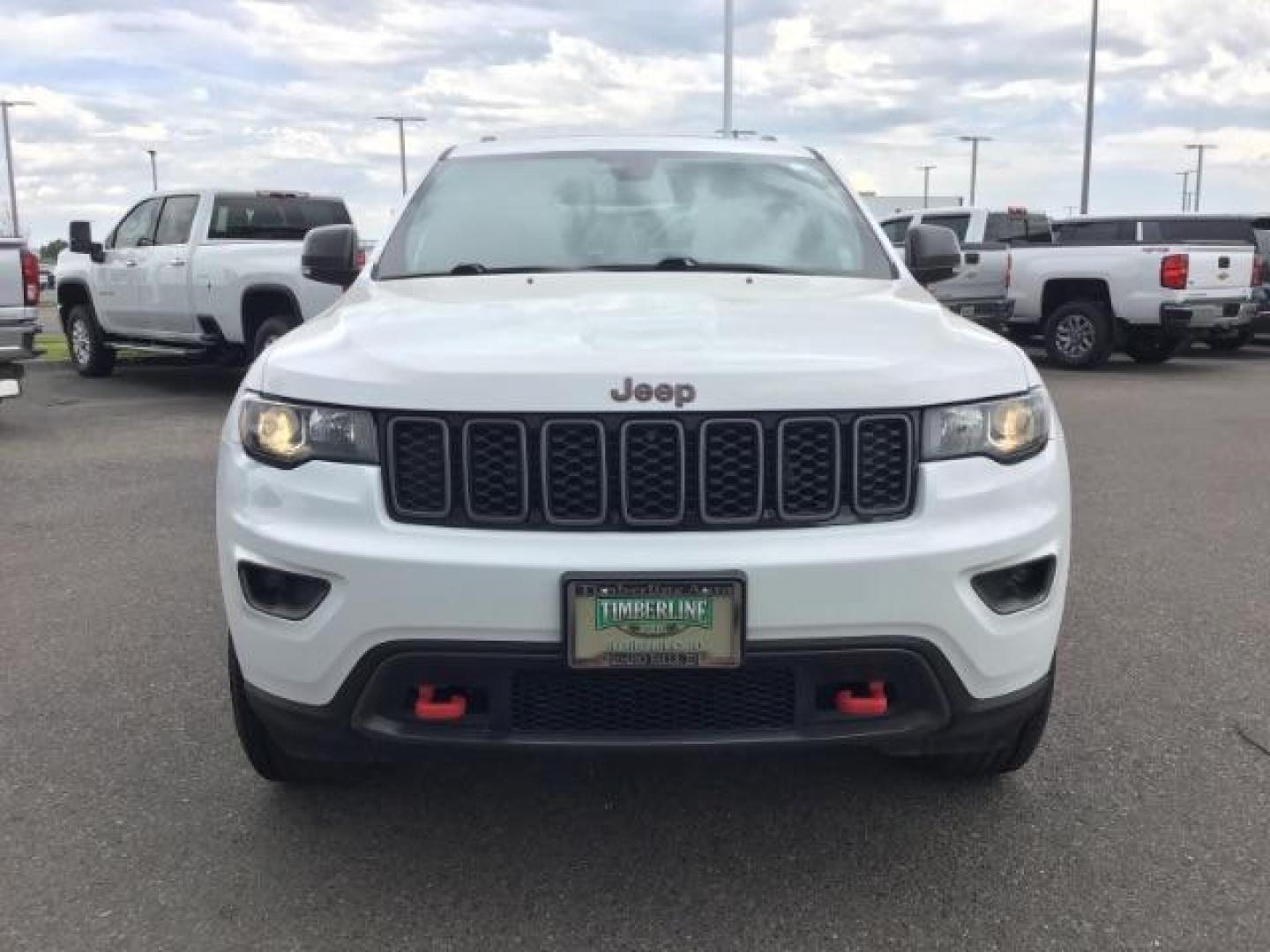 2020 Bright White Clear Coat /Black/Ruby Red, leather Jeep Grand Cherokee Trailhawk 4WD (1C4RJFLG5LC) with an 3.6L V6 DOHC 24V engine, 8-Speed Automatic transmission, located at 1235 N Woodruff Ave., Idaho Falls, 83401, (208) 523-1053, 43.507172, -112.000488 - Leather and loaded, heated and cooled seats, blind spot monitors, AWD, low miles. At Timberline Auto it is always easy to find a great deal on your next vehicle! Our experienced sales staff can help find the right vehicle that will fit your needs. Our knowledgeable finance department has options for - Photo#7