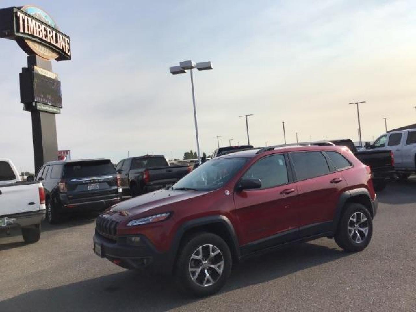 2017 Deep Cherry Red Crystal Pearl Coat /Black, leather/cloth Jeep Cherokee Trailhawk 4WD (1C4PJMBB0HW) with an 2.4L L4 DOHC 16V engine, 9-Speed Automatic transmission, located at 1235 N Woodruff Ave., Idaho Falls, 83401, (208) 523-1053, 43.507172, -112.000488 - This 2017 Jeep Cherokee Trail Hawk, Has the 2.4L motor. It has 137,365 miles. It has leather interior, heated seats, keyless remote, tinted glass. Interior and Exterior, are in excellent condition. At Timberline Auto it is always easy to find a great deal on your next vehicle! Our experienced sales - Photo#0