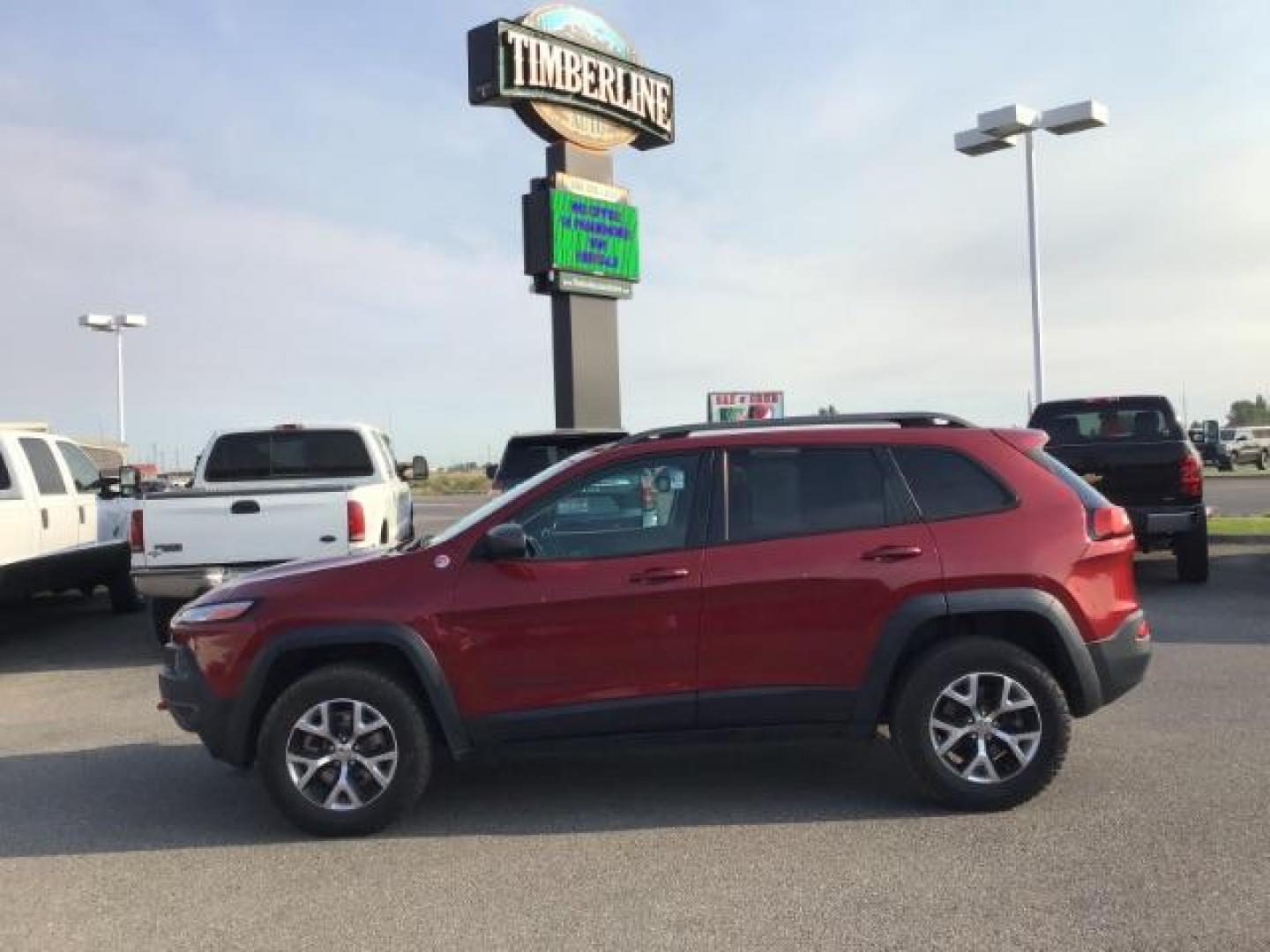 2017 Deep Cherry Red Crystal Pearl Coat /Black, leather/cloth Jeep Cherokee Trailhawk 4WD (1C4PJMBB0HW) with an 2.4L L4 DOHC 16V engine, 9-Speed Automatic transmission, located at 1235 N Woodruff Ave., Idaho Falls, 83401, (208) 523-1053, 43.507172, -112.000488 - This 2017 Jeep Cherokee Trail Hawk, Has the 2.4L motor. It has 137,365 miles. It has leather interior, heated seats, keyless remote, tinted glass. Interior and Exterior, are in excellent condition. At Timberline Auto it is always easy to find a great deal on your next vehicle! Our experienced sales - Photo#1