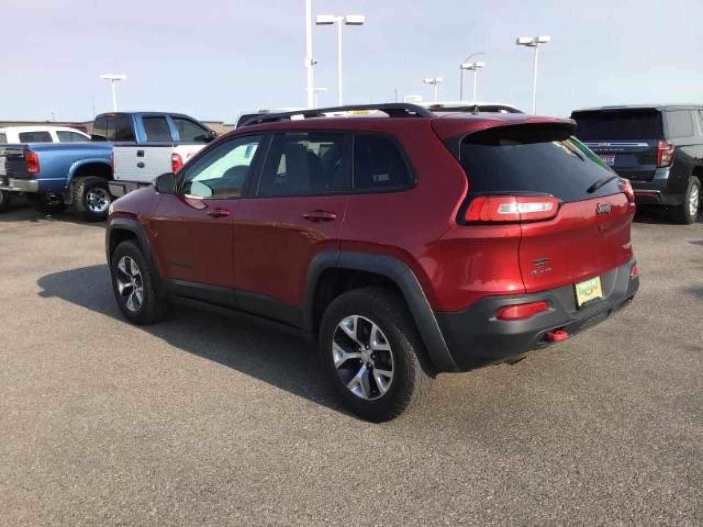 2017 Deep Cherry Red Crystal Pearl Coat /Black, leather/cloth Jeep Cherokee Trailhawk 4WD (1C4PJMBB0HW) with an 2.4L L4 DOHC 16V engine, 9-Speed Automatic transmission, located at 1235 N Woodruff Ave., Idaho Falls, 83401, (208) 523-1053, 43.507172, -112.000488 - This 2017 Jeep Cherokee Trail Hawk, Has the 2.4L motor. It has 137,365 miles. It has leather interior, heated seats, keyless remote, tinted glass. Interior and Exterior, are in excellent condition. At Timberline Auto it is always easy to find a great deal on your next vehicle! Our experienced sales - Photo#2