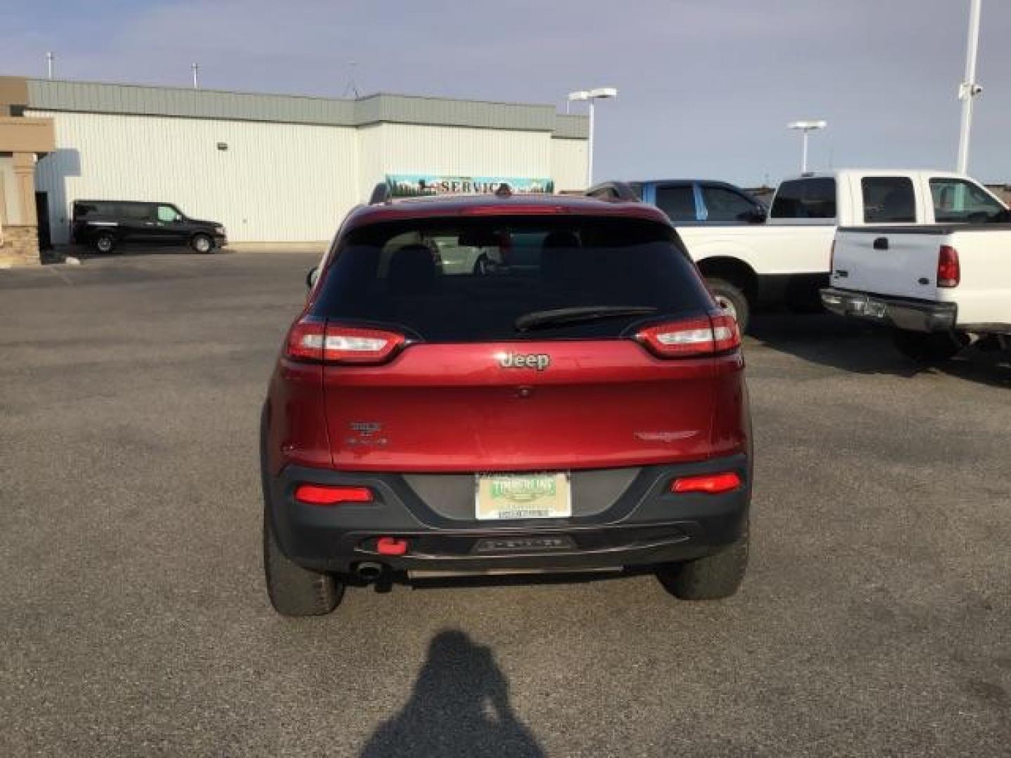 2017 Deep Cherry Red Crystal Pearl Coat /Black, leather/cloth Jeep Cherokee Trailhawk 4WD (1C4PJMBB0HW) with an 2.4L L4 DOHC 16V engine, 9-Speed Automatic transmission, located at 1235 N Woodruff Ave., Idaho Falls, 83401, (208) 523-1053, 43.507172, -112.000488 - This 2017 Jeep Cherokee Trail Hawk, Has the 2.4L motor. It has 137,365 miles. It has leather interior, heated seats, keyless remote, tinted glass. Interior and Exterior, are in excellent condition. At Timberline Auto it is always easy to find a great deal on your next vehicle! Our experienced sales - Photo#3