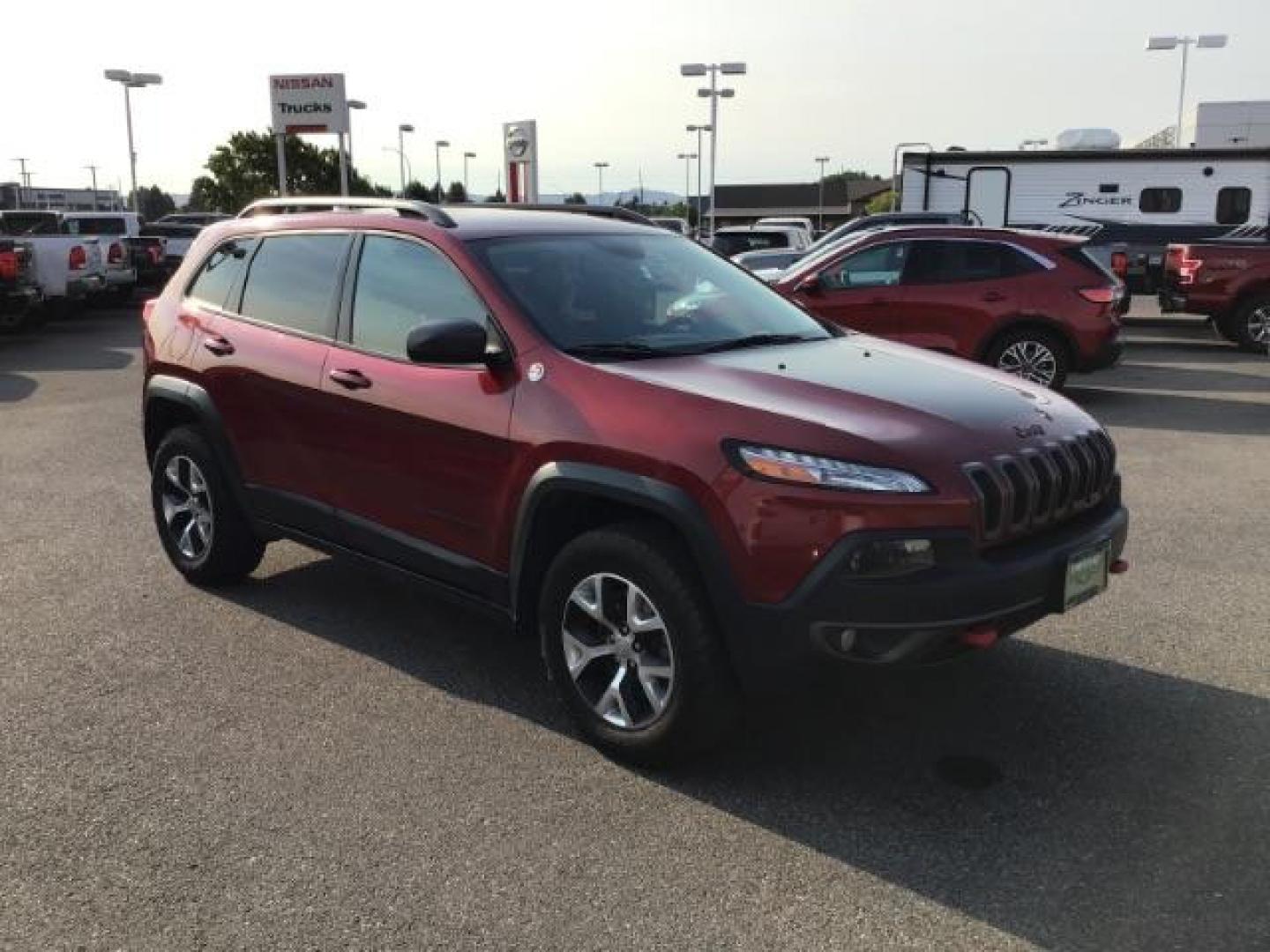 2017 Deep Cherry Red Crystal Pearl Coat /Black, leather/cloth Jeep Cherokee Trailhawk 4WD (1C4PJMBB0HW) with an 2.4L L4 DOHC 16V engine, 9-Speed Automatic transmission, located at 1235 N Woodruff Ave., Idaho Falls, 83401, (208) 523-1053, 43.507172, -112.000488 - This 2017 Jeep Cherokee Trail Hawk, Has the 2.4L motor. It has 137,365 miles. It has leather interior, heated seats, keyless remote, tinted glass. Interior and Exterior, are in excellent condition. At Timberline Auto it is always easy to find a great deal on your next vehicle! Our experienced sales - Photo#6