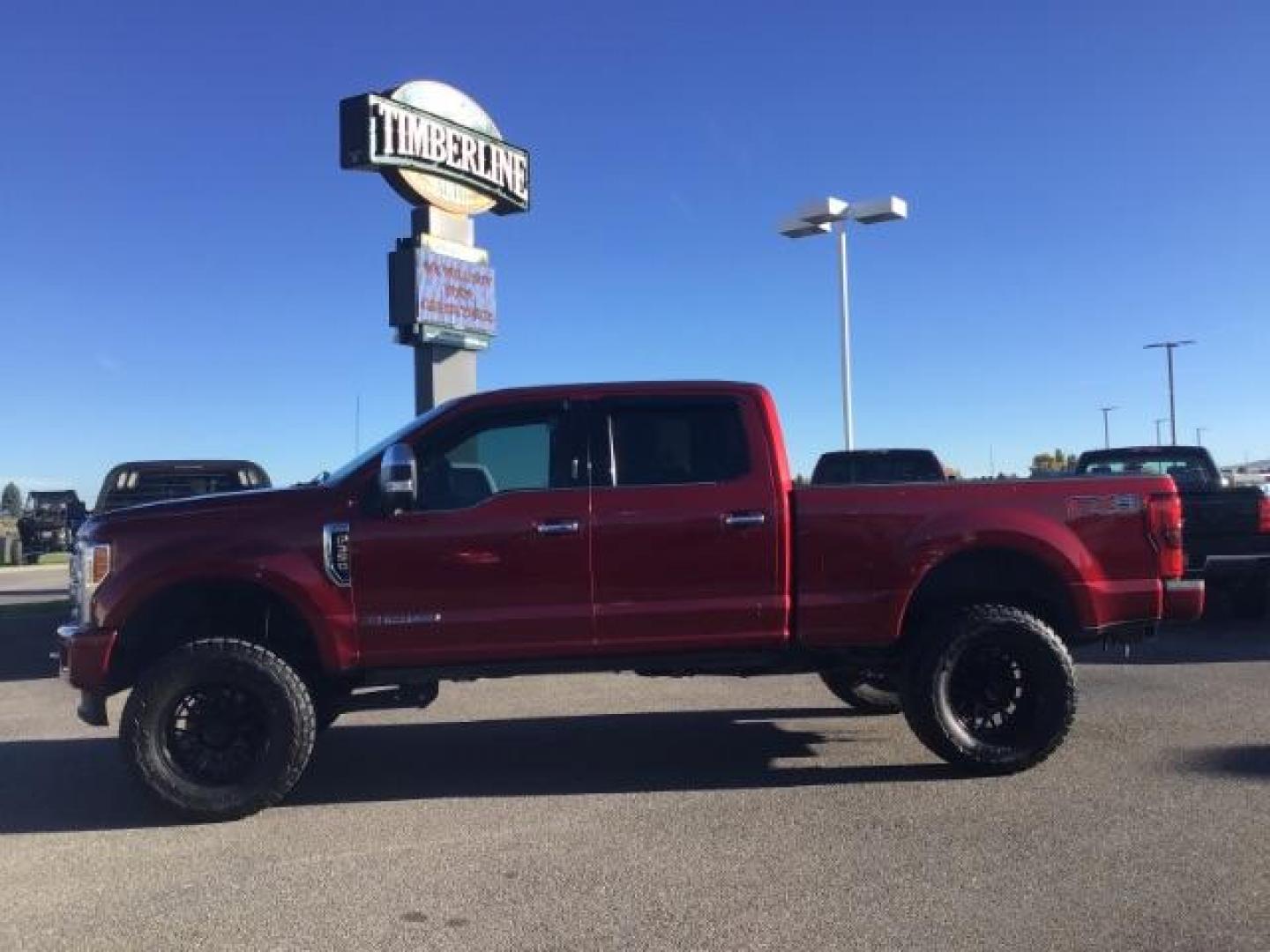 2018 RED /LEATHER Ford F-350 SD PLATINUM (1FT8W3BT4JE) with an 6.7 engine, AUTOMATIC transmission, located at 1235 N Woodruff Ave., Idaho Falls, 83401, (208) 523-1053, 43.507172, -112.000488 - This 2018 Ford F350 Platinum , has the 6.7L V8 diesel motor. Comes with retractable running boards, turnover ball, in the bed of the truck, push button start, navigation, lift kit, heated and cooled seats, sunroof, and bluetooth. At Timberline Auto it is always easy to find a great deal on your next - Photo#1