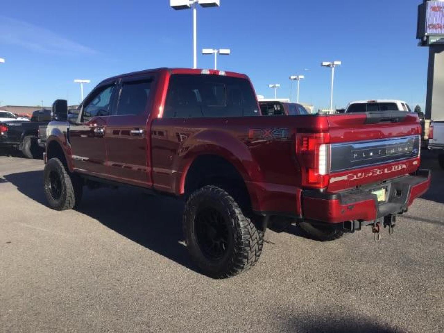 2018 RED /LEATHER Ford F-350 SD PLATINUM (1FT8W3BT4JE) with an 6.7 engine, AUTOMATIC transmission, located at 1235 N Woodruff Ave., Idaho Falls, 83401, (208) 523-1053, 43.507172, -112.000488 - This 2018 Ford F350 Platinum , has the 6.7L V8 diesel motor. Comes with retractable running boards, turnover ball, in the bed of the truck, push button start, navigation, lift kit, heated and cooled seats, sunroof, and bluetooth. At Timberline Auto it is always easy to find a great deal on your next - Photo#2