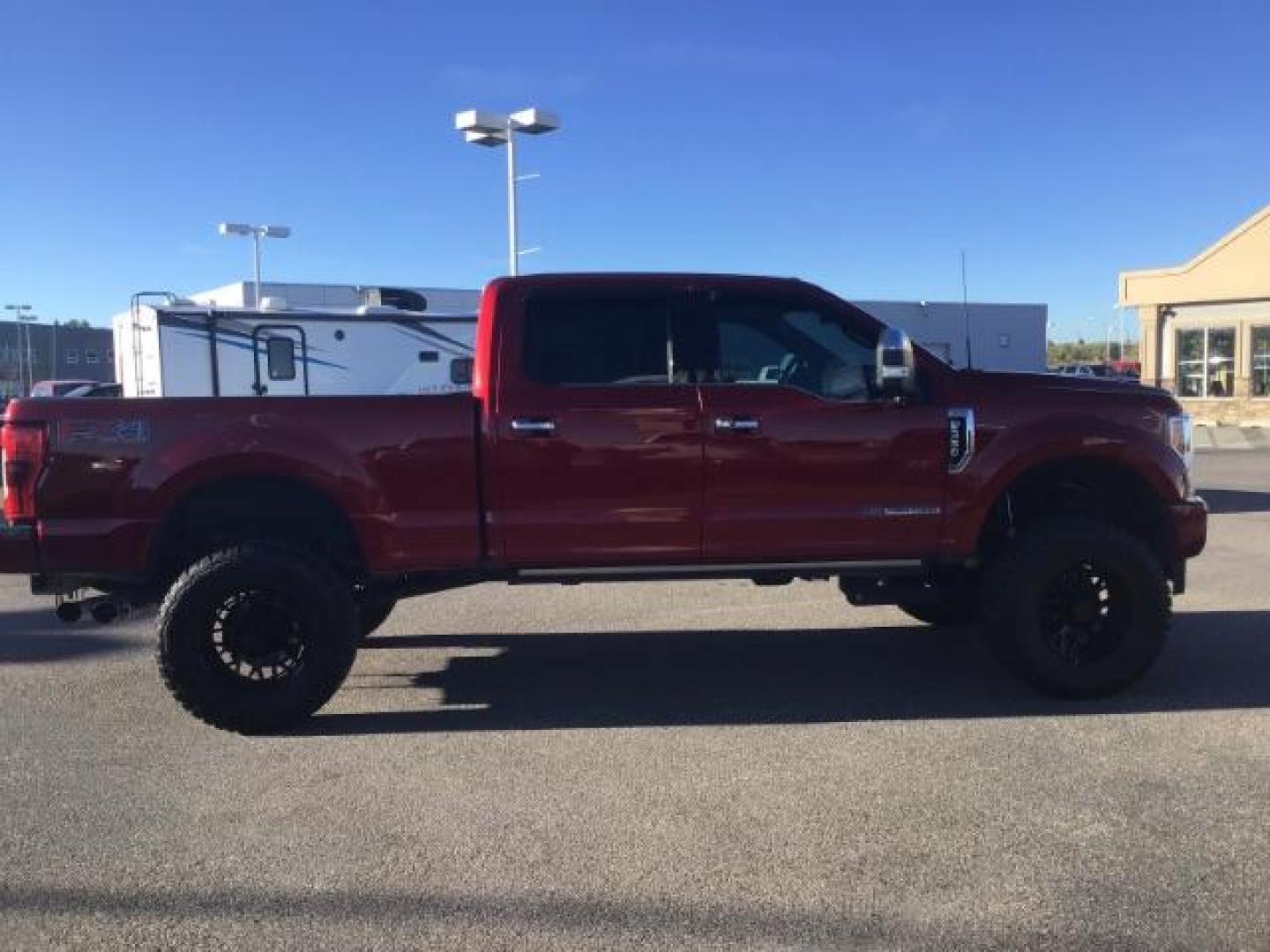 2018 RED /LEATHER Ford F-350 SD PLATINUM (1FT8W3BT4JE) with an 6.7 engine, AUTOMATIC transmission, located at 1235 N Woodruff Ave., Idaho Falls, 83401, (208) 523-1053, 43.507172, -112.000488 - This 2018 Ford F350 Platinum , has the 6.7L V8 diesel motor. Comes with retractable running boards, turnover ball, in the bed of the truck, push button start, navigation, lift kit, heated and cooled seats, sunroof, and bluetooth. At Timberline Auto it is always easy to find a great deal on your next - Photo#5