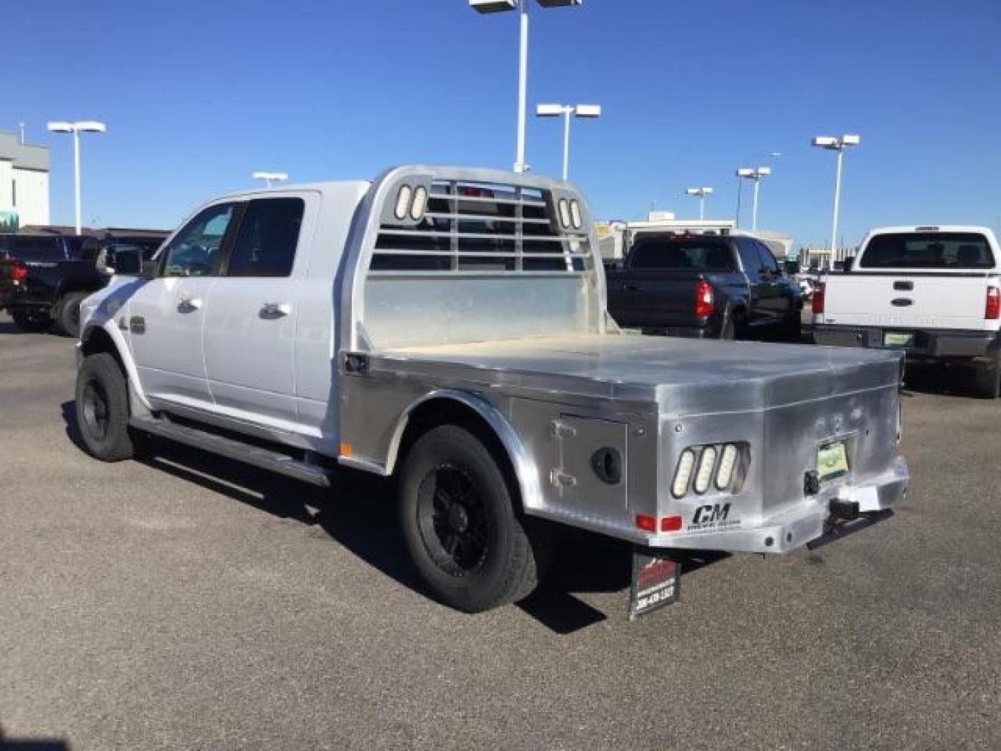 2015 Bright White Clear Coat /LEATHER RAM 2500 Longhorn Mega Cab SWB 4WD (3C6UR5PL9FG) with an 6.7L L6 OHV 24V TURBO DIESEL engine, 6-Speed Automatic transmission, located at 1235 N Woodruff Ave., Idaho Falls, 83401, (208) 523-1053, 43.507172, -112.000488 - This 2015 Ram 2500 Mega Cab Longhorn Edition, has the 6.7L Diesel motor. It has 159,423 miles. It comes with a flat bed, running boards, sunroof, heated and cooled seats, and rear heated seats. At Timberline Auto it is always easy to find a great deal on your next vehicle! Our experienced sales st - Photo#2