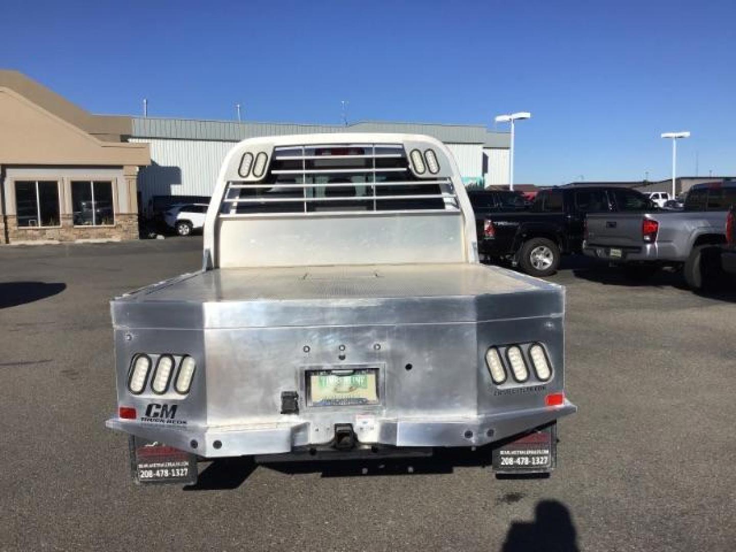 2015 Bright White Clear Coat /LEATHER RAM 2500 Longhorn Mega Cab SWB 4WD (3C6UR5PL9FG) with an 6.7L L6 OHV 24V TURBO DIESEL engine, 6-Speed Automatic transmission, located at 1235 N Woodruff Ave., Idaho Falls, 83401, (208) 523-1053, 43.507172, -112.000488 - This 2015 Ram 2500 Mega Cab Longhorn Edition, has the 6.7L Diesel motor. It has 159,423 miles. It comes with a flat bed, running boards, sunroof, heated and cooled seats, and rear heated seats. At Timberline Auto it is always easy to find a great deal on your next vehicle! Our experienced sales st - Photo#3