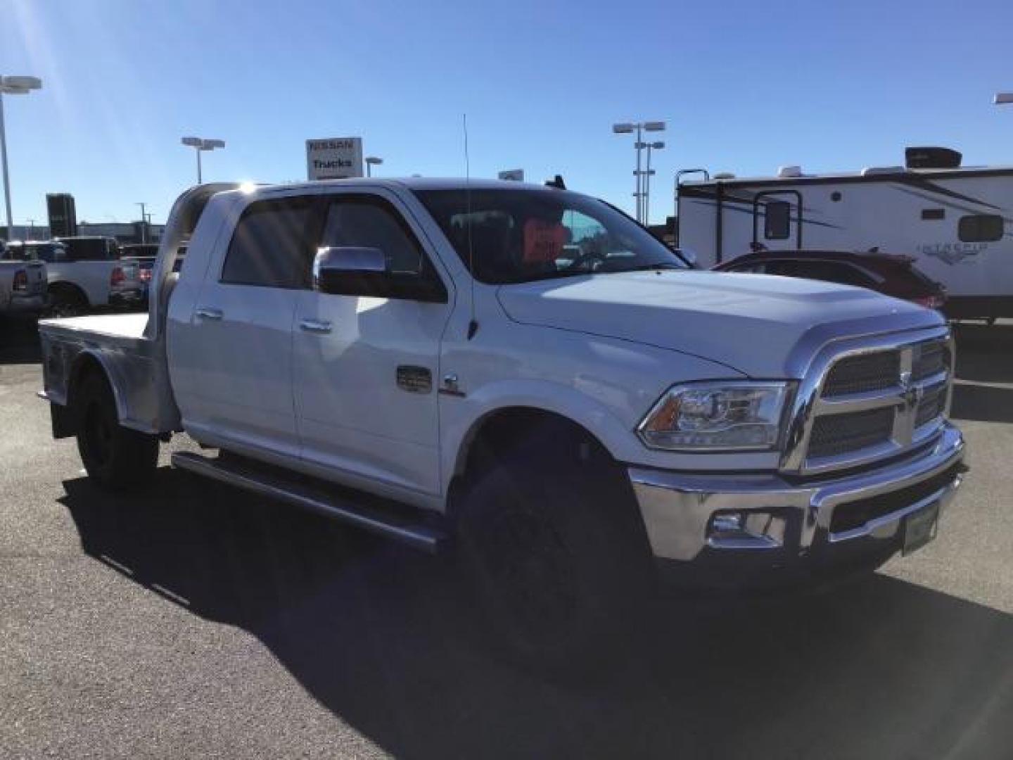 2015 Bright White Clear Coat /LEATHER RAM 2500 Longhorn Mega Cab SWB 4WD (3C6UR5PL9FG) with an 6.7L L6 OHV 24V TURBO DIESEL engine, 6-Speed Automatic transmission, located at 1235 N Woodruff Ave., Idaho Falls, 83401, (208) 523-1053, 43.507172, -112.000488 - This 2015 Ram 2500 Mega Cab Longhorn Edition, has the 6.7L Diesel motor. It has 159,423 miles. It comes with a flat bed, running boards, sunroof, heated and cooled seats, and rear heated seats. At Timberline Auto it is always easy to find a great deal on your next vehicle! Our experienced sales st - Photo#6