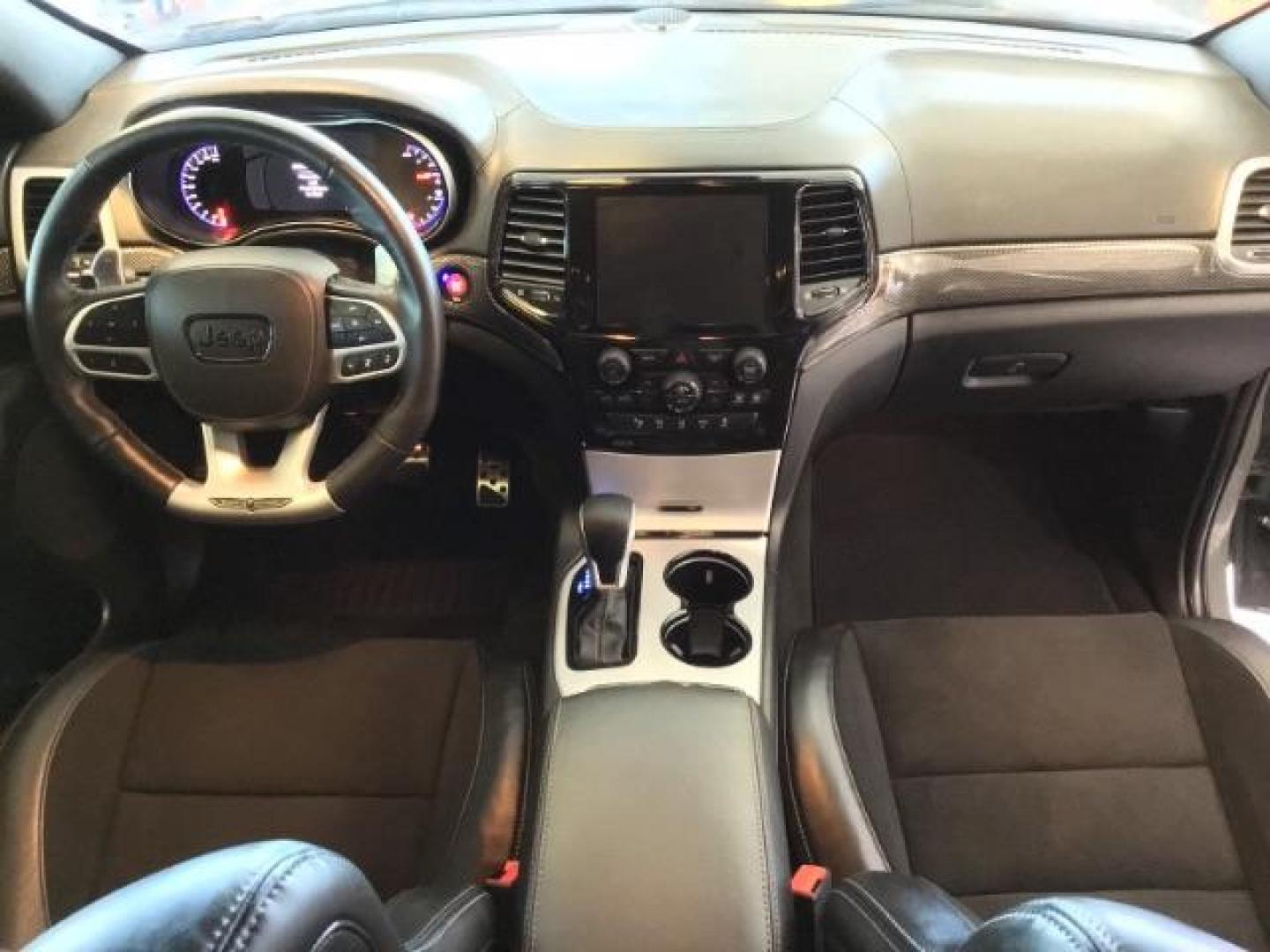 2021 Sting-Gray Clear Coat /Black, premium leather/sueded microfiber Jeep Grand Cherokee Trackhawk (1C4RJFN92MC) with an 6.2L V8 SUPERCHARGED engine, 8-Speed Automatic transmission, located at 1235 N Woodruff Ave., Idaho Falls, 83401, (208) 523-1053, 43.507172, -112.000488 - Here's a 2021 Jeep Grand Cherokee TrackHawk! This is a 6.2L Supercharged V8 SUV! It seats 5 people, has a massive cargo area, and it's AWD, so you'll be able to enjoy it year round! This Jeep has 707 horsepower and a 0-60 in just 3.5 seconds! The TrackHawk focused on power but that doesn't mean it s - Photo#19