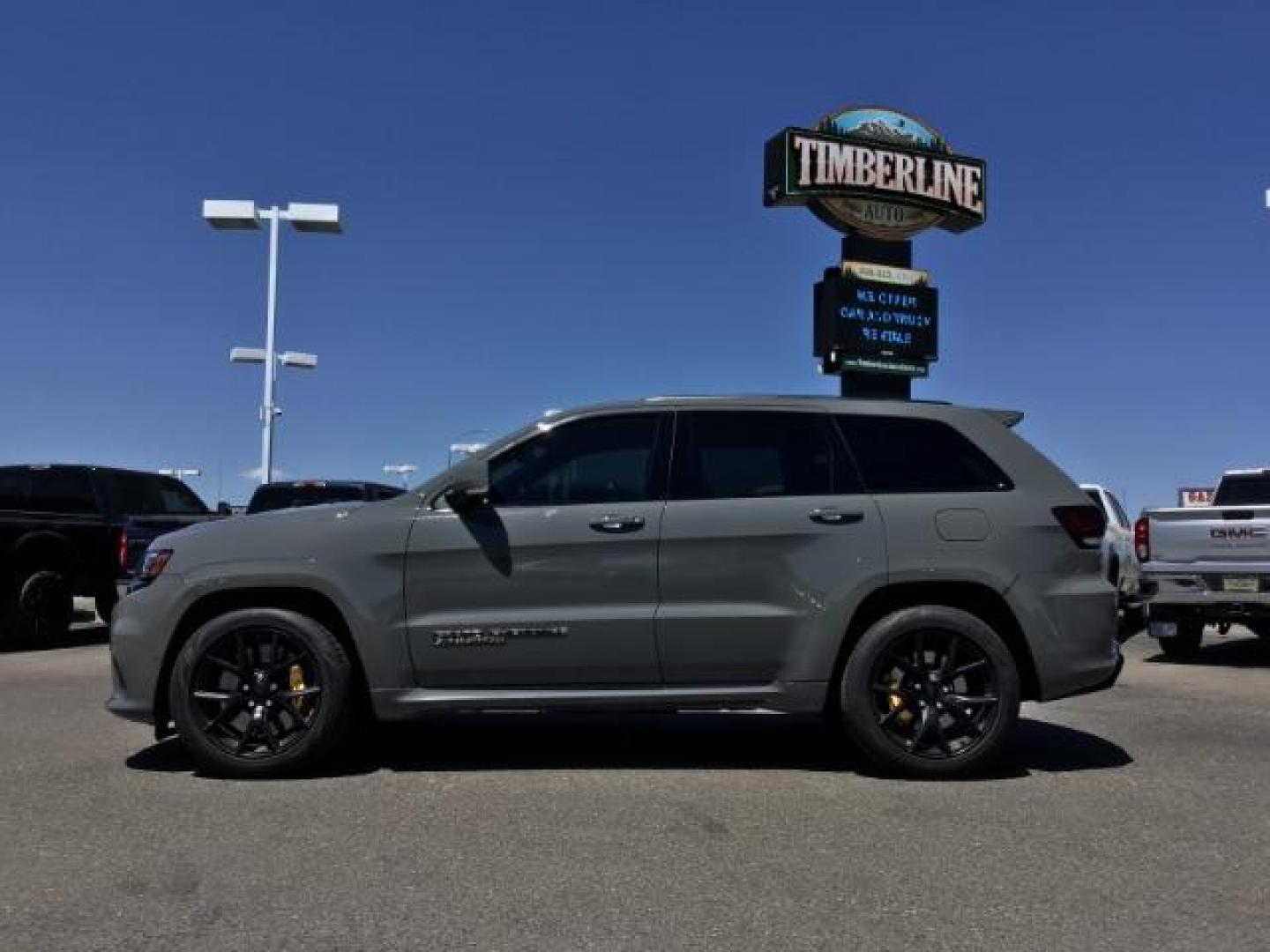 2021 Sting-Gray Clear Coat /Black, premium leather/sueded microfiber Jeep Grand Cherokee Trackhawk (1C4RJFN92MC) with an 6.2L V8 SUPERCHARGED engine, 8-Speed Automatic transmission, located at 1235 N Woodruff Ave., Idaho Falls, 83401, (208) 523-1053, 43.507172, -112.000488 - Here's a 2021 Jeep Grand Cherokee TrackHawk! This is a 6.2L Supercharged V8 SUV! It seats 5 people, has a massive cargo area, and it's AWD, so you'll be able to enjoy it year round! This Jeep has 707 horsepower and a 0-60 in just 3.5 seconds! The TrackHawk focused on power but that doesn't mean it s - Photo#2