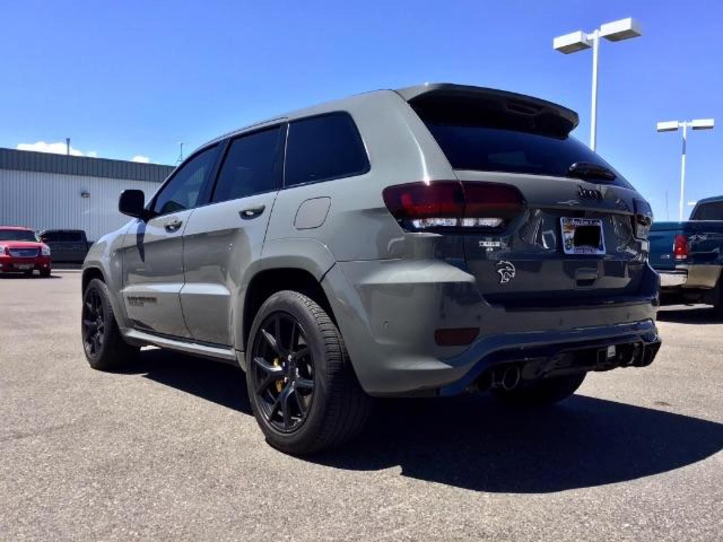 2021 Sting-Gray Clear Coat /Black, premium leather/sueded microfiber Jeep Grand Cherokee Trackhawk (1C4RJFN92MC) with an 6.2L V8 SUPERCHARGED engine, 8-Speed Automatic transmission, located at 1235 N Woodruff Ave., Idaho Falls, 83401, (208) 523-1053, 43.507172, -112.000488 - Here's a 2021 Jeep Grand Cherokee TrackHawk! This is a 6.2L Supercharged V8 SUV! It seats 5 people, has a massive cargo area, and it's AWD, so you'll be able to enjoy it year round! This Jeep has 707 horsepower and a 0-60 in just 3.5 seconds! The TrackHawk focused on power but that doesn't mean it s - Photo#3