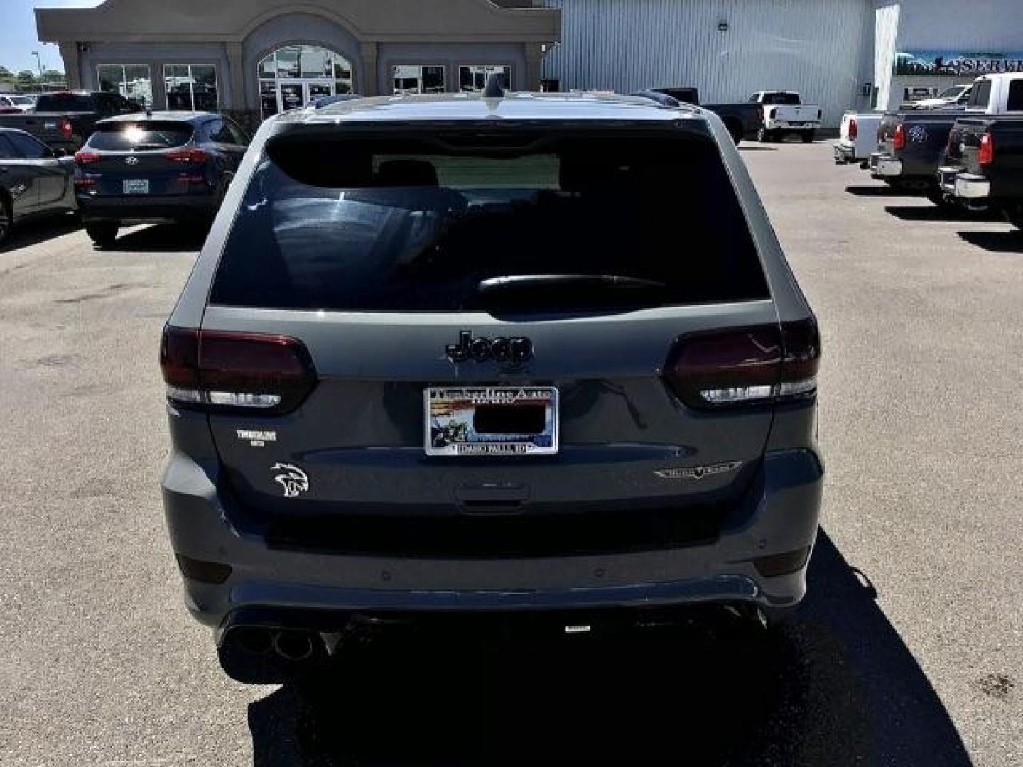 2021 Sting-Gray Clear Coat /Black, premium leather/sueded microfiber Jeep Grand Cherokee Trackhawk (1C4RJFN92MC) with an 6.2L V8 SUPERCHARGED engine, 8-Speed Automatic transmission, located at 1235 N Woodruff Ave., Idaho Falls, 83401, (208) 523-1053, 43.507172, -112.000488 - Here's a 2021 Jeep Grand Cherokee TrackHawk! This is a 6.2L Supercharged V8 SUV! It seats 5 people, has a massive cargo area, and it's AWD, so you'll be able to enjoy it year round! This Jeep has 707 horsepower and a 0-60 in just 3.5 seconds! The TrackHawk focused on power but that doesn't mean it s - Photo#4