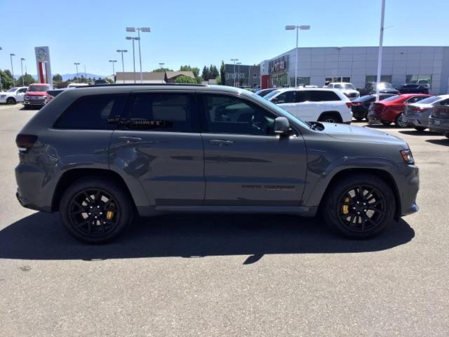 2021 Sting-Gray Clear Coat /Black, premium leather/sueded microfiber Jeep Grand Cherokee Trackhawk (1C4RJFN92MC) with an 6.2L V8 SUPERCHARGED engine, 8-Speed Automatic transmission, located at 1235 N Woodruff Ave., Idaho Falls, 83401, (208) 523-1053, 43.507172, -112.000488 - Here's a 2021 Jeep Grand Cherokee TrackHawk! This is a 6.2L Supercharged V8 SUV! It seats 5 people, has a massive cargo area, and it's AWD, so you'll be able to enjoy it year round! This Jeep has 707 horsepower and a 0-60 in just 3.5 seconds! The TrackHawk focused on power but that doesn't mean it s - Photo#7