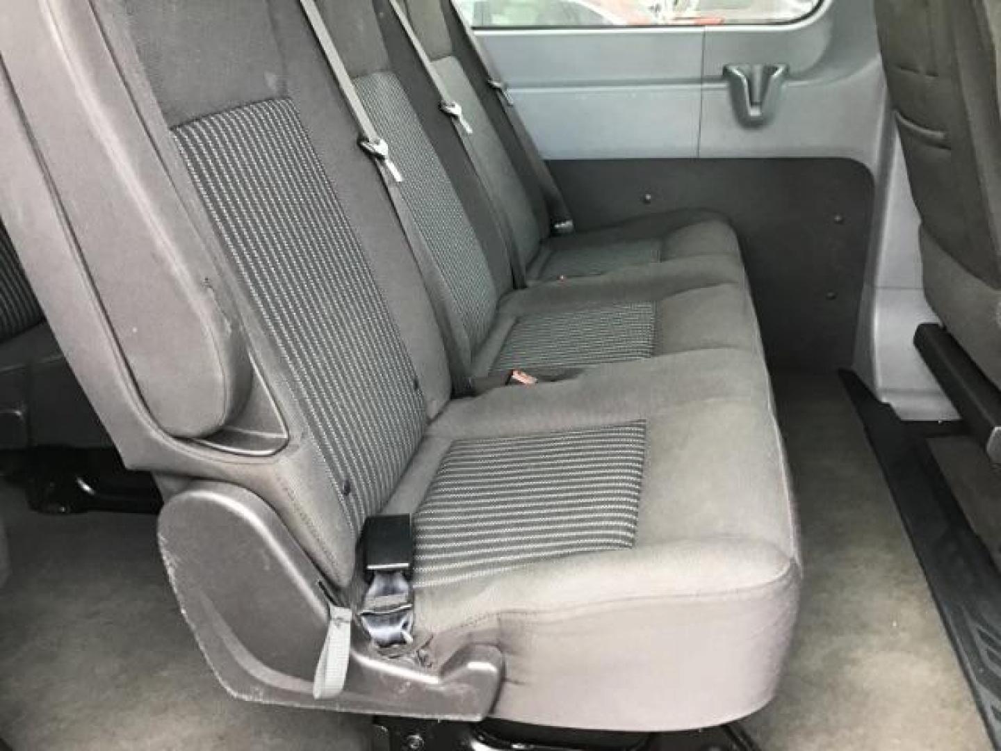 2018 WHITE /XL Ford Transit 350 Wagon Low Roof XL w/Sliding Pass. 148-in. WB (1FBZX2YG2JK) with an 3.5L V6 DOHC 24V engine, 6-Speed Automatic transmission, located at 1235 N Woodruff Ave., Idaho Falls, 83401, (208) 523-1053, 43.507172, -112.000488 - This 2018 Ford Transit Van, will seat up to 15 passengers. It has 74,000 miles. Comes with bluetooth and satellite radio. At Timberline Auto it is always easy to find a great deal on your next vehicle! Our experienced sales staff can help find the right vehicle that will fit your needs. Our knowle - Photo#19