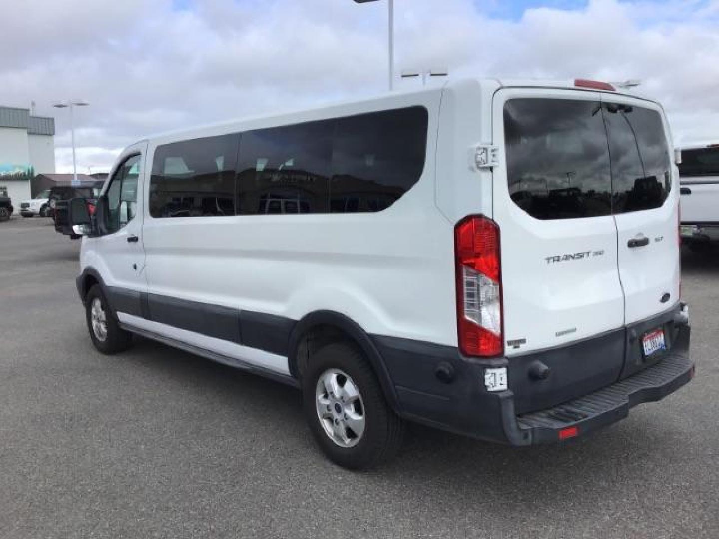 2018 WHITE /XL Ford Transit 350 Wagon Low Roof XL w/Sliding Pass. 148-in. WB (1FBZX2YG2JK) with an 3.5L V6 DOHC 24V engine, 6-Speed Automatic transmission, located at 1235 N Woodruff Ave., Idaho Falls, 83401, (208) 523-1053, 43.507172, -112.000488 - This 2018 Ford Transit Van, will seat up to 15 passengers. It has 74,000 miles. Comes with bluetooth and satellite radio. At Timberline Auto it is always easy to find a great deal on your next vehicle! Our experienced sales staff can help find the right vehicle that will fit your needs. Our knowle - Photo#2